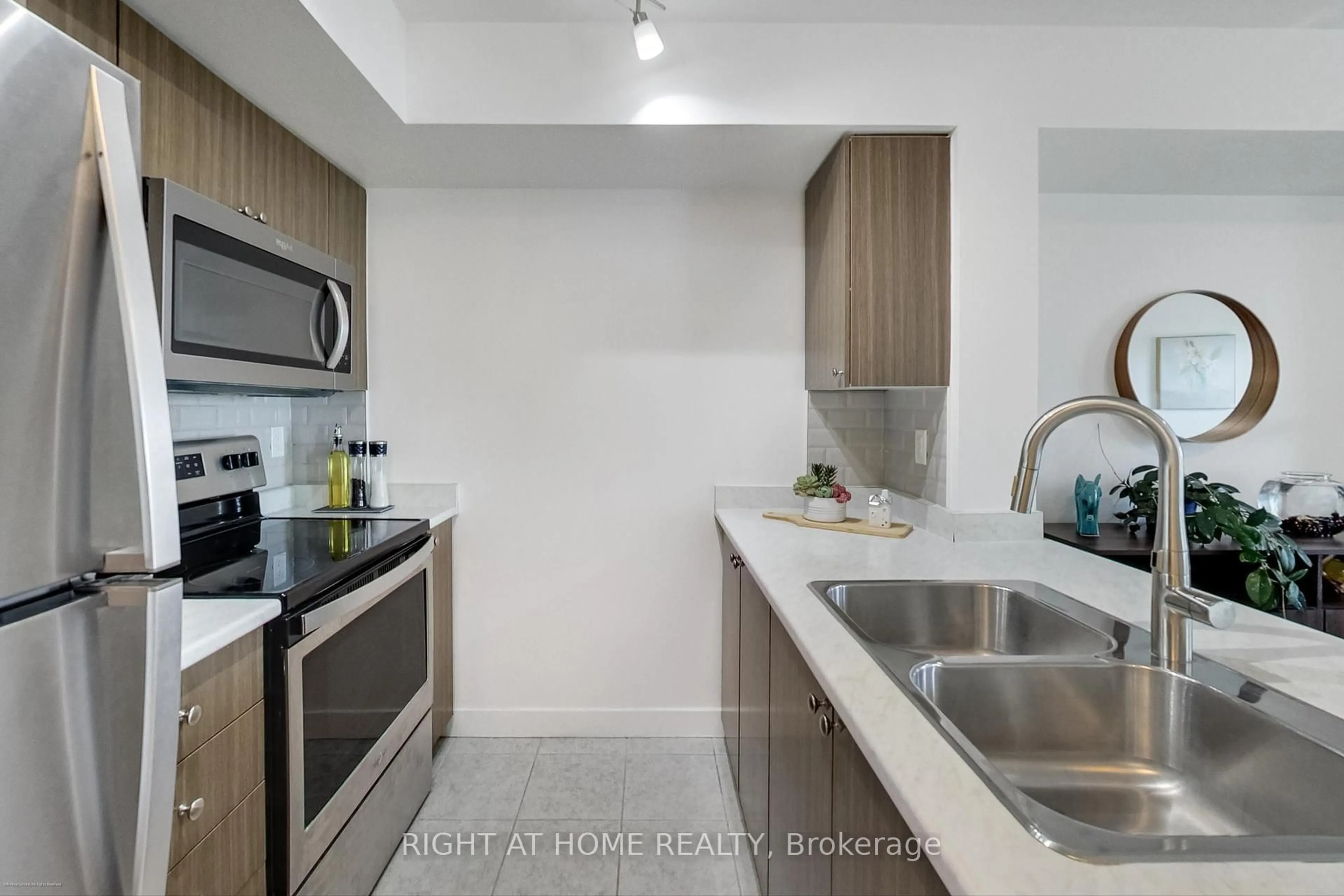 Standard kitchen, ceramic/tile floor for 1346 Danforth Rd #706, Toronto Ontario M1J 0A9