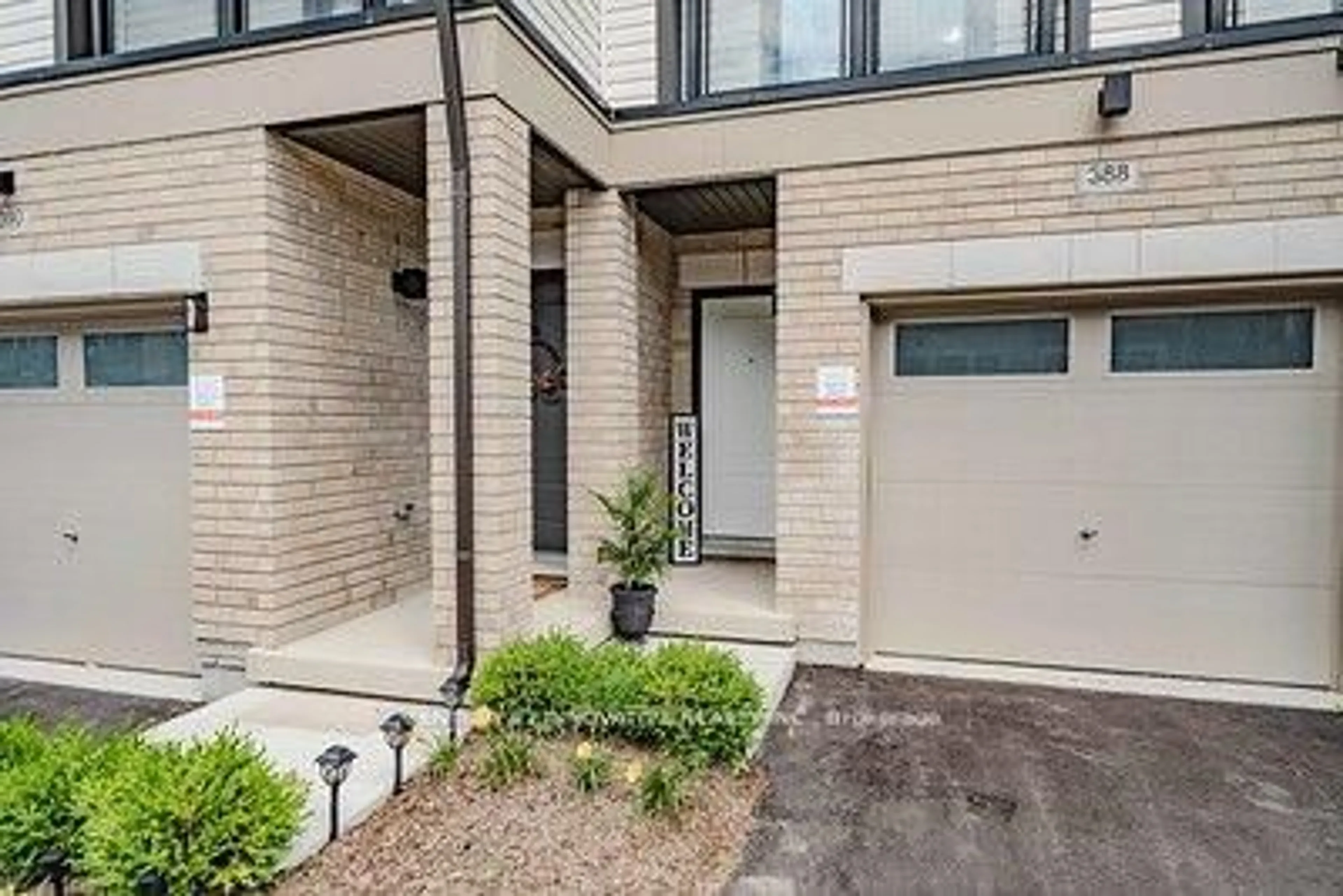 Home with brick exterior material, street for 388 Okanagan Path, Oshawa Ontario L1H 0B1
