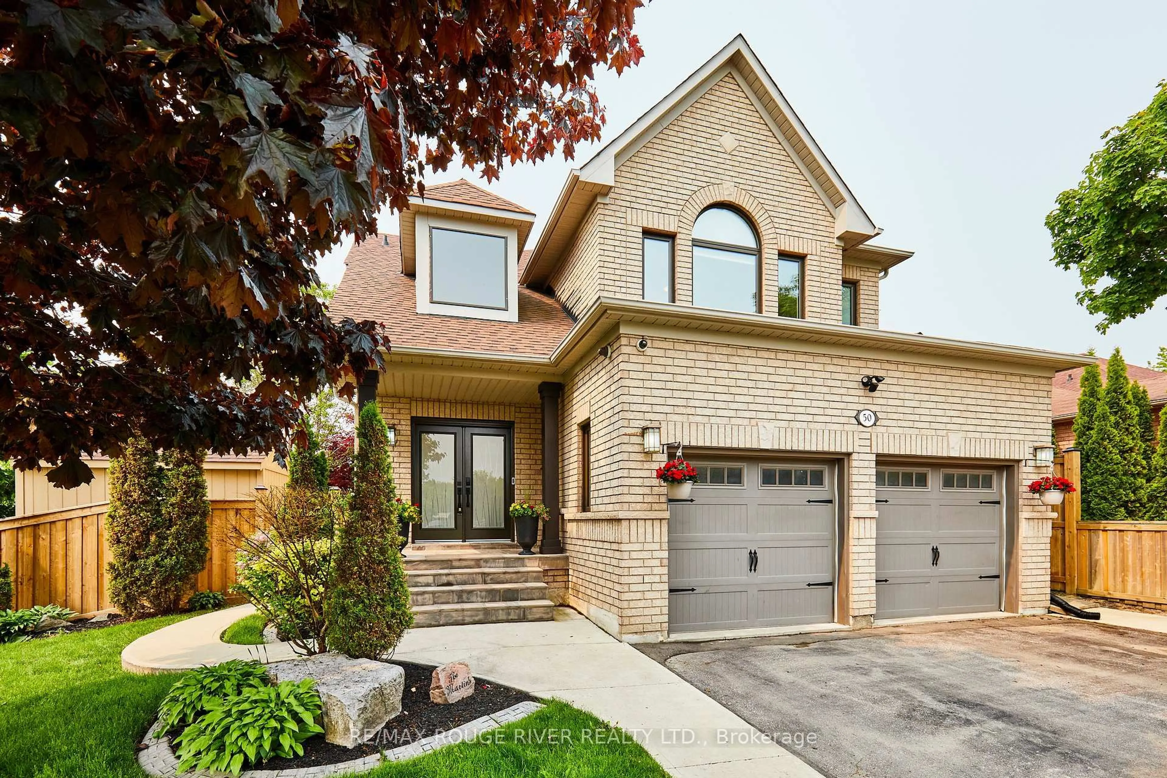 Home with brick exterior material, street for 50 West Side Dr, Clarington Ontario L1C 4Y8