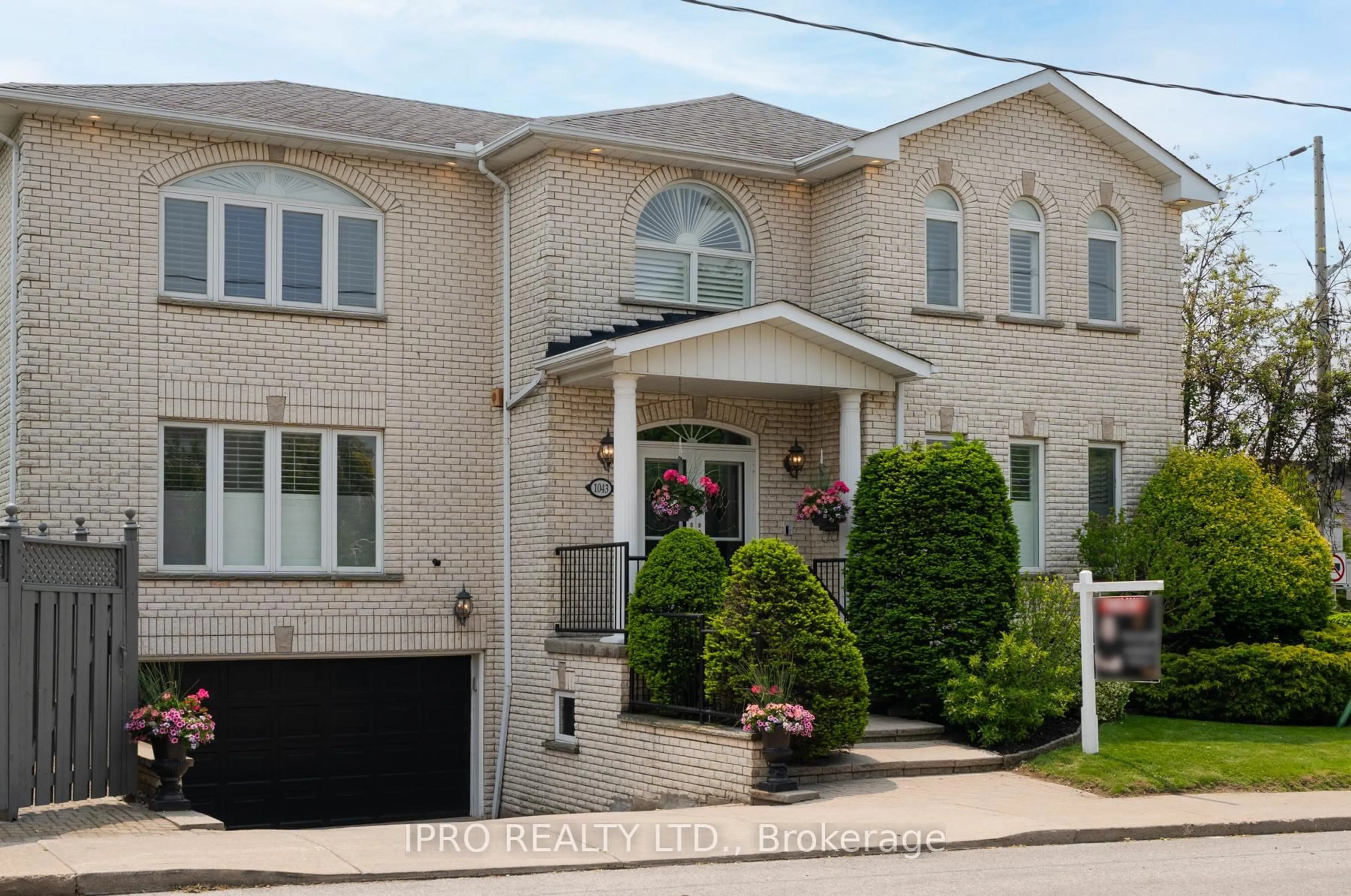 Home with brick exterior material, street for 1043 Greenwood Ave, Toronto Ontario M4J 4C9