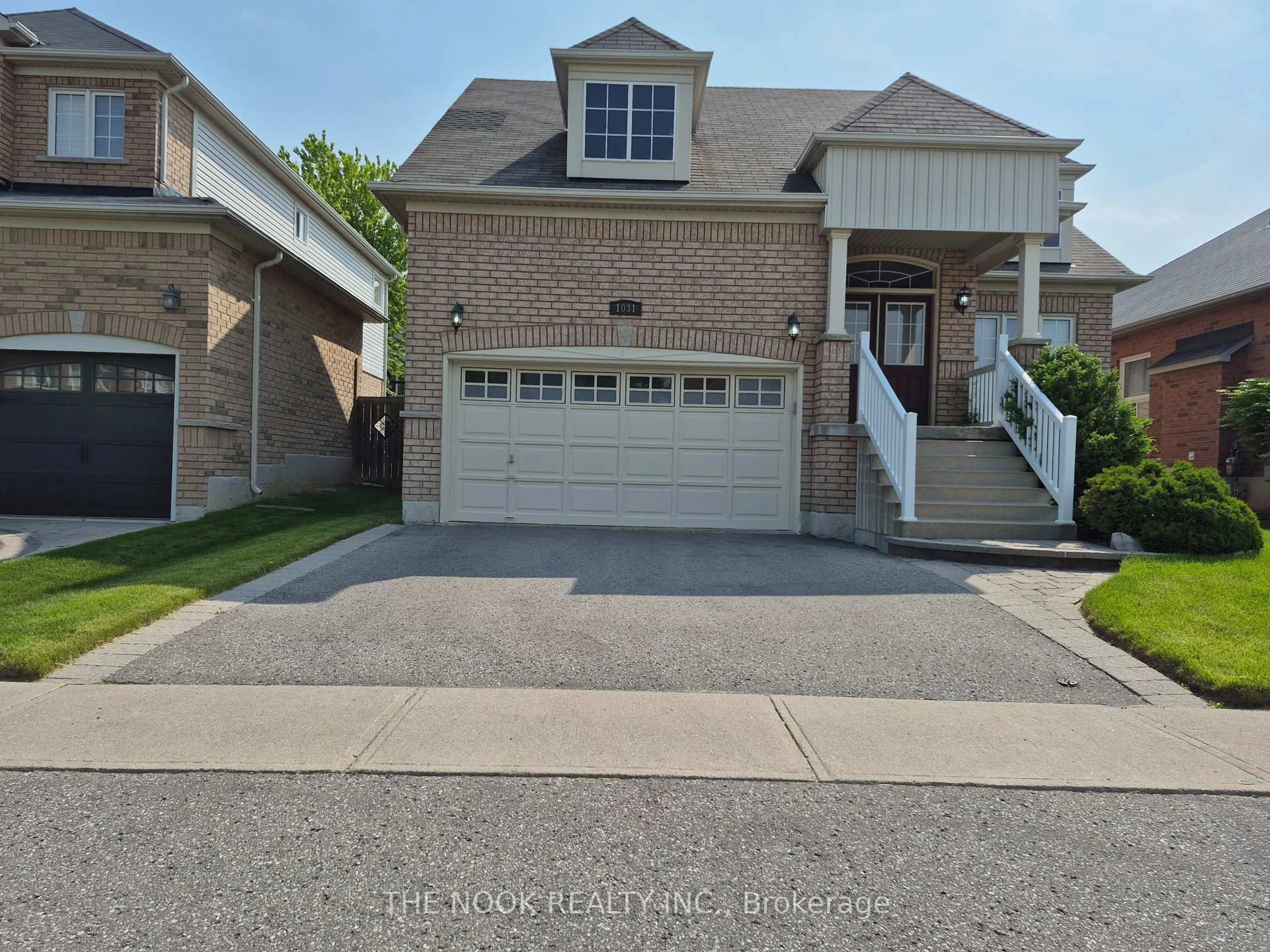 Home with brick exterior material, street for 1031 Eagle Ridge Dr, Oshawa Ontario L1K 0C8