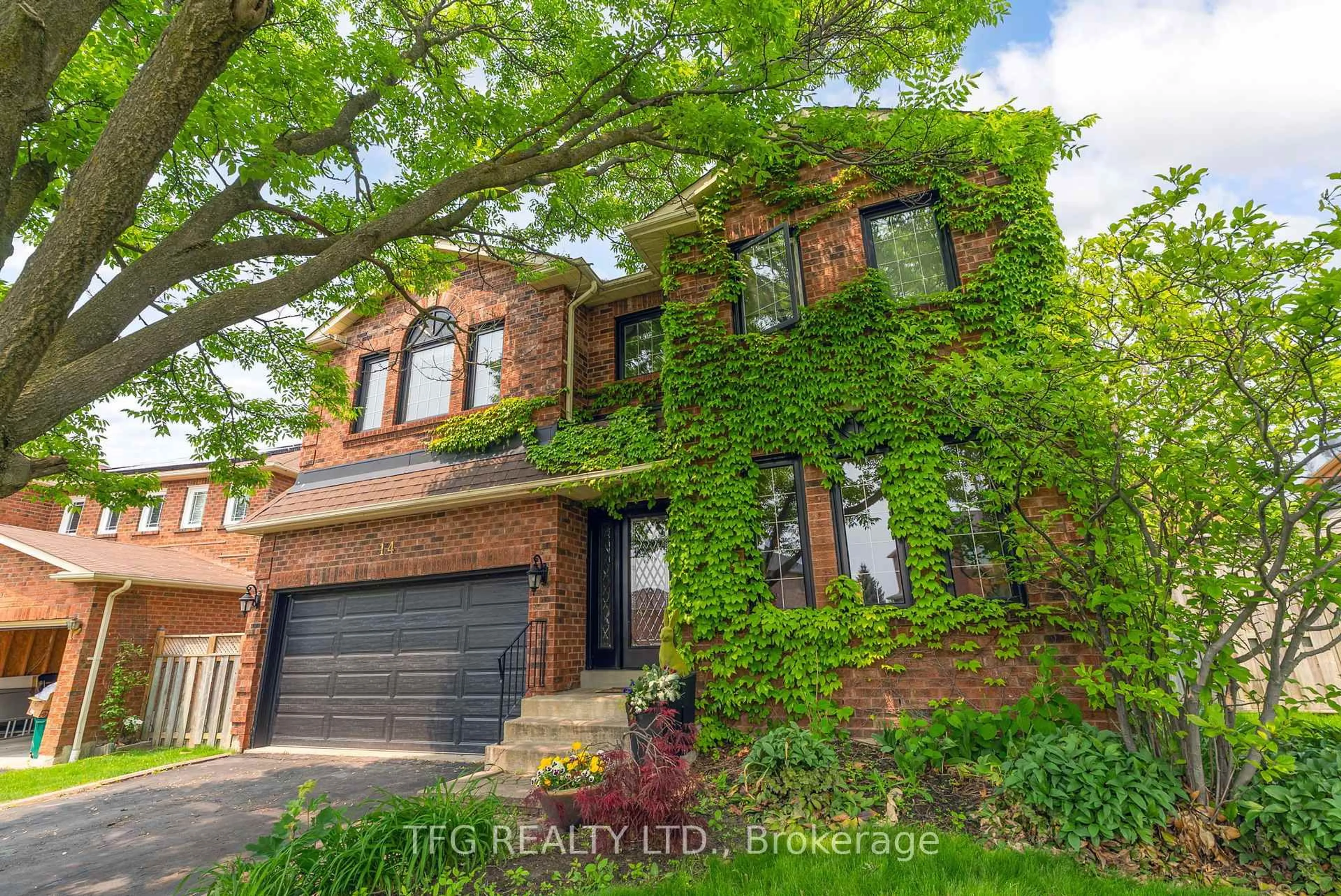 Home with brick exterior material, street for 14 Lismer Dr, Whitby Ontario L1N 9A3