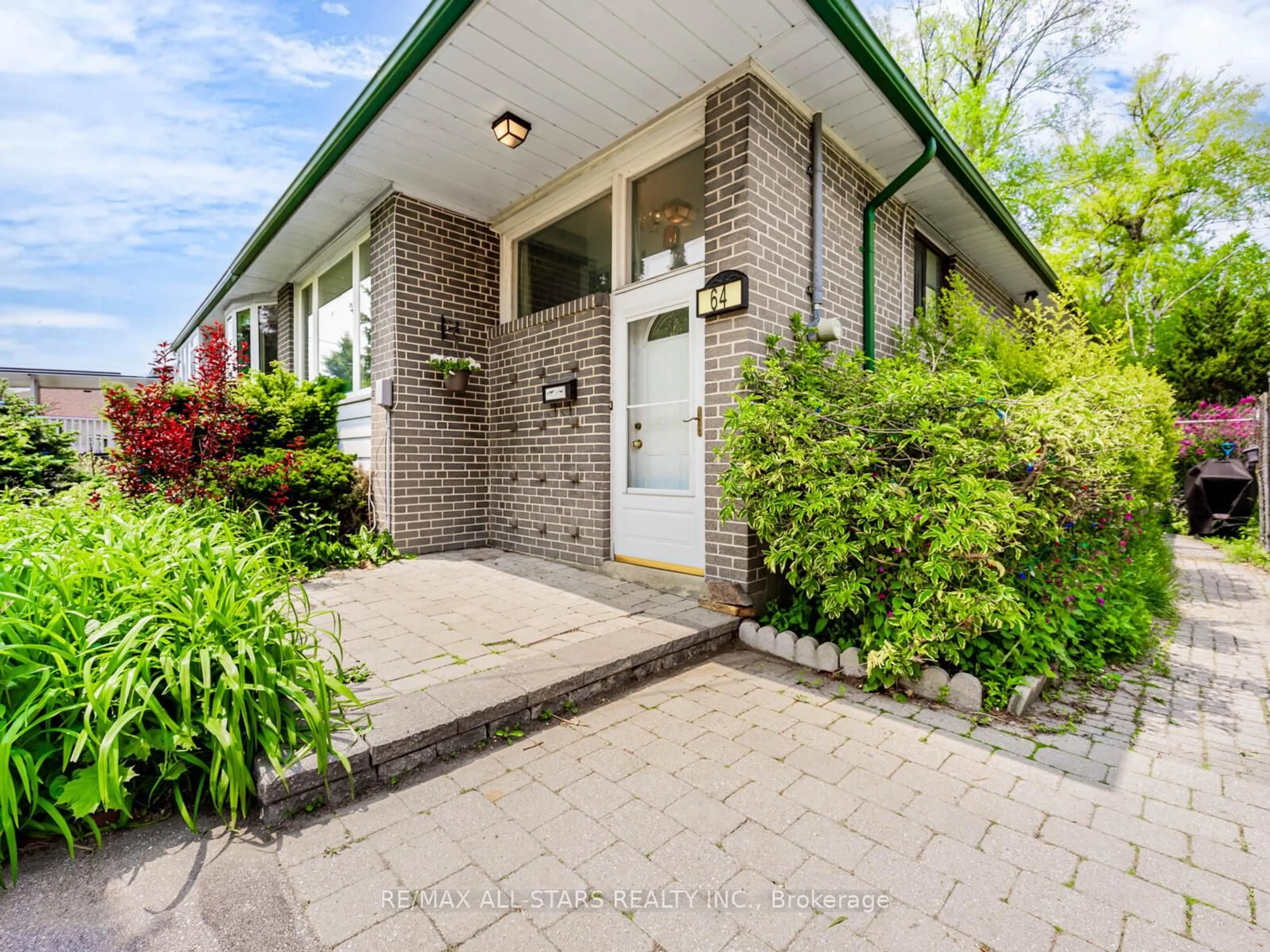 Home with brick exterior material, street for 64 Greyabbey Tr, Toronto Ontario M1E 1V7