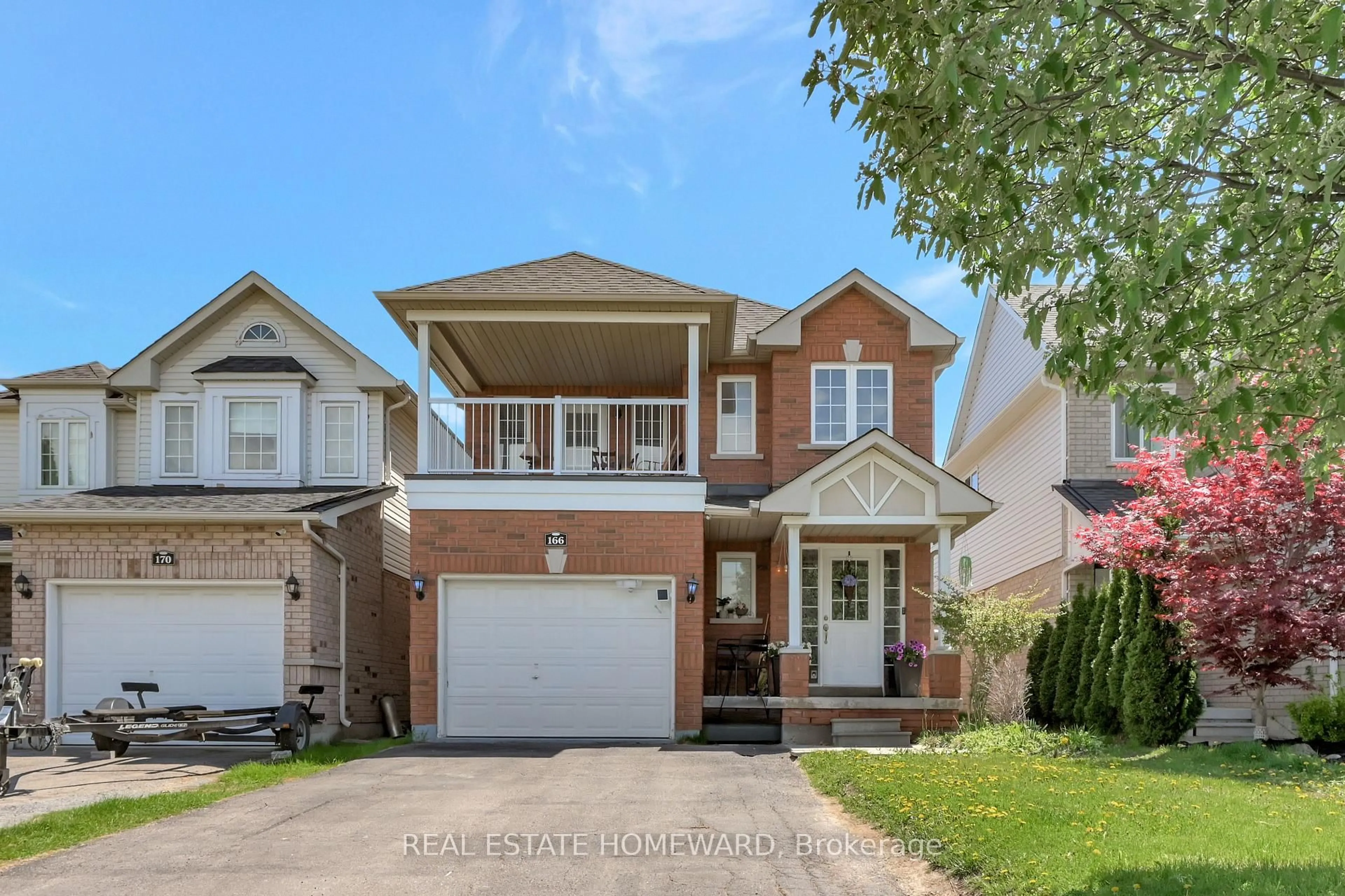 Home with brick exterior material, street for 166 Hutton Pl, Clarington Ontario L1C 5K2