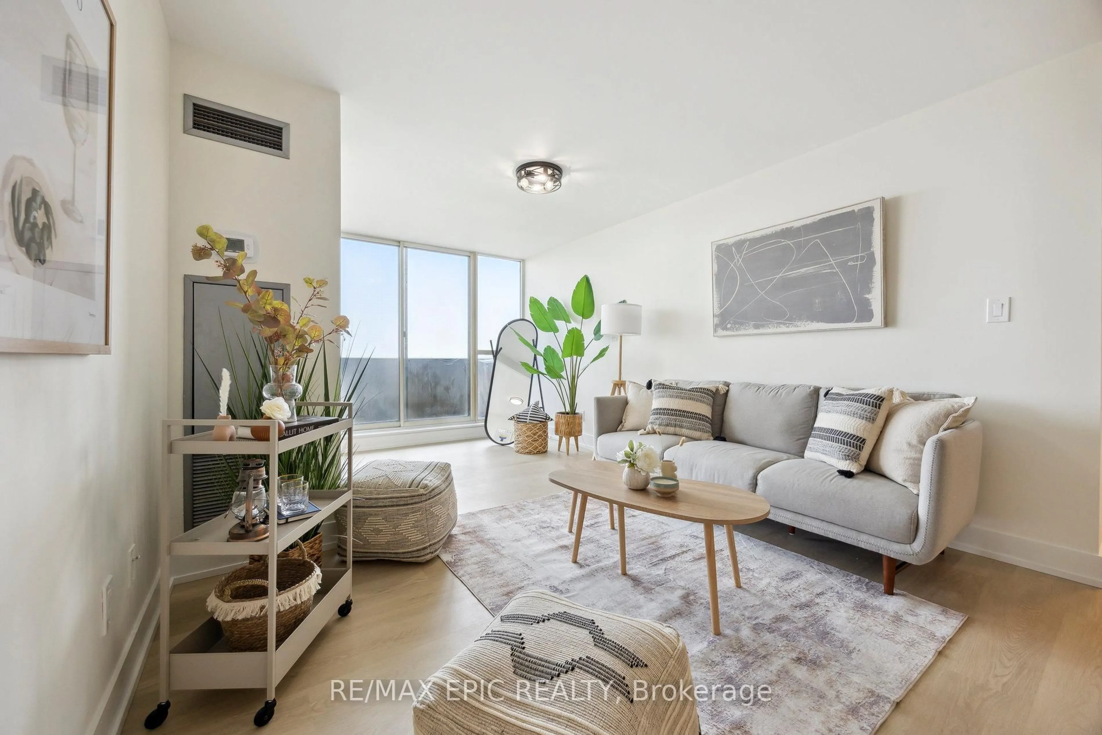 Living room with furniture, unknown for 30 Thunder Grve #PH10, Toronto Ontario M1V 4A3