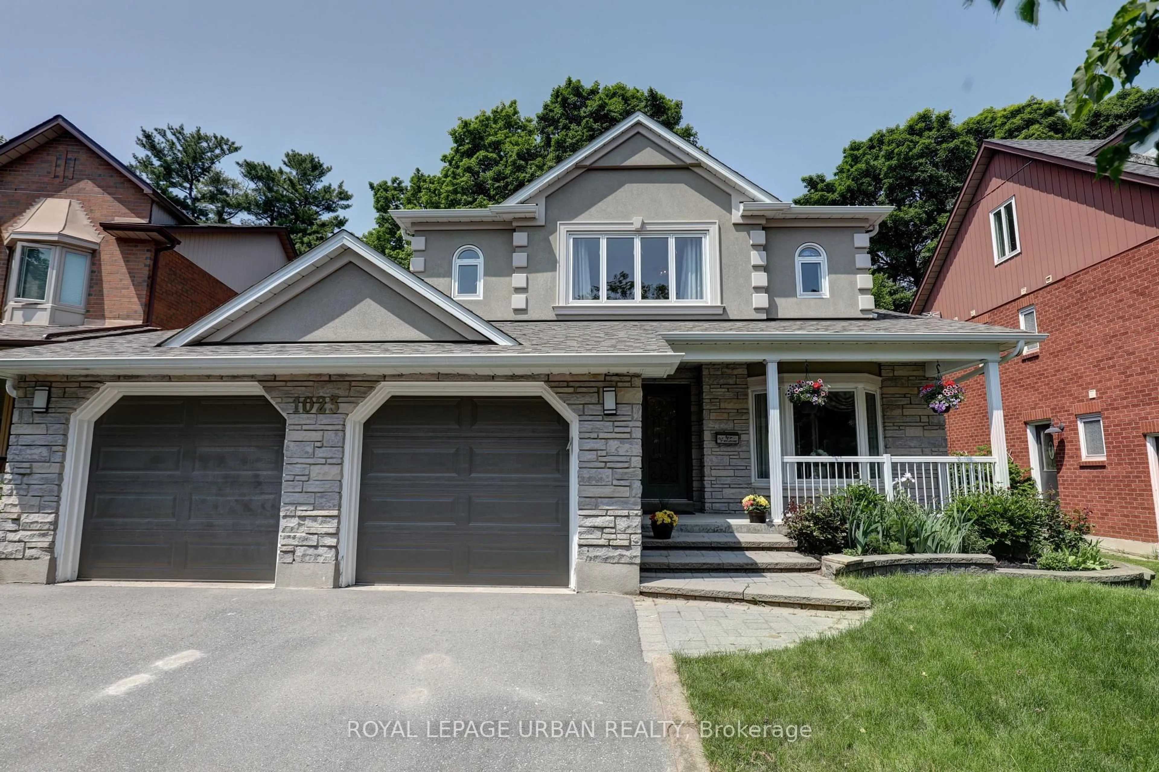 Home with brick exterior material, street for 1023 Mountcastle Cres, Pickering Ontario L1V 5J1