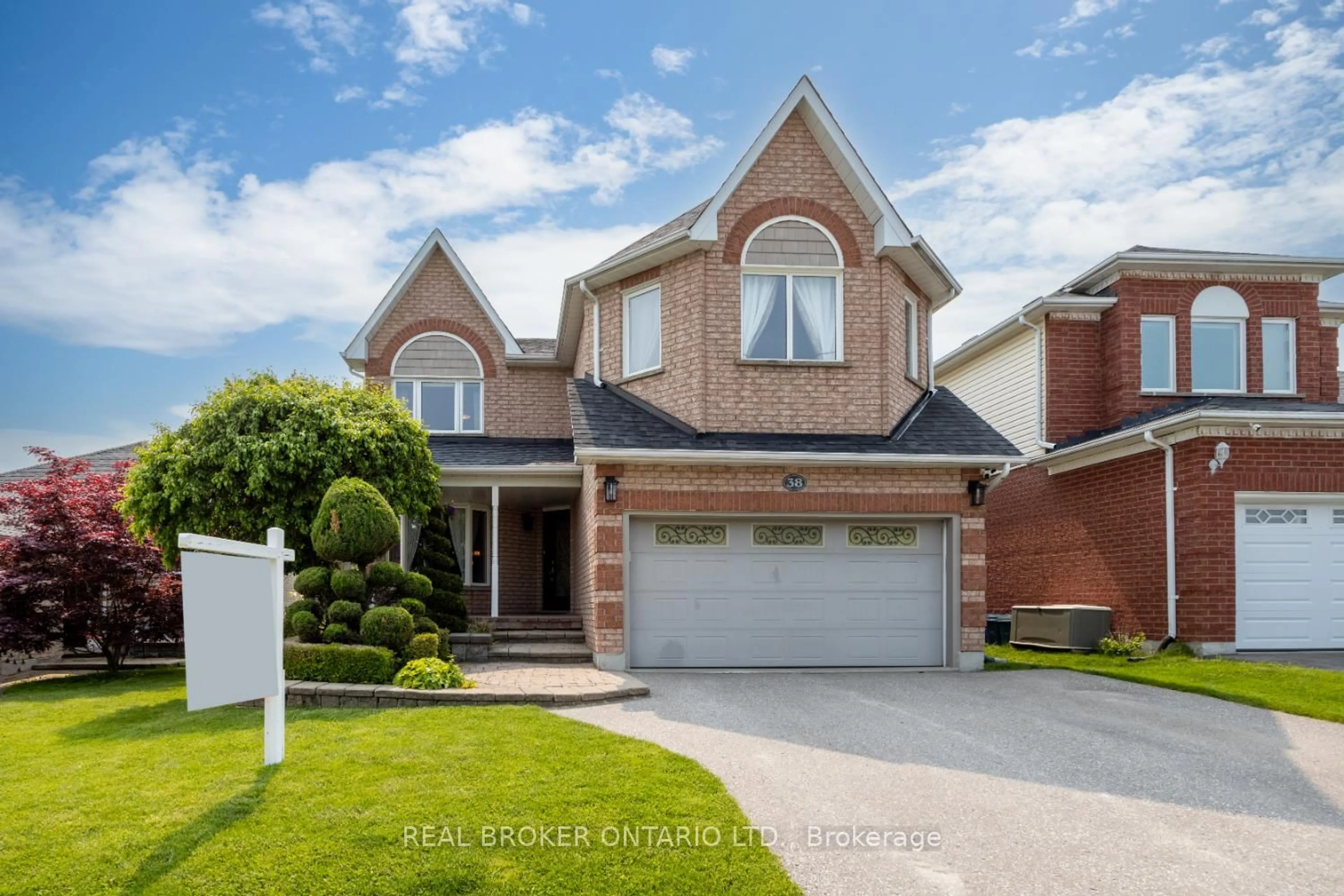 Home with brick exterior material, street for 38 Apple Blossom Blvd, Clarington Ontario L1C 4L9
