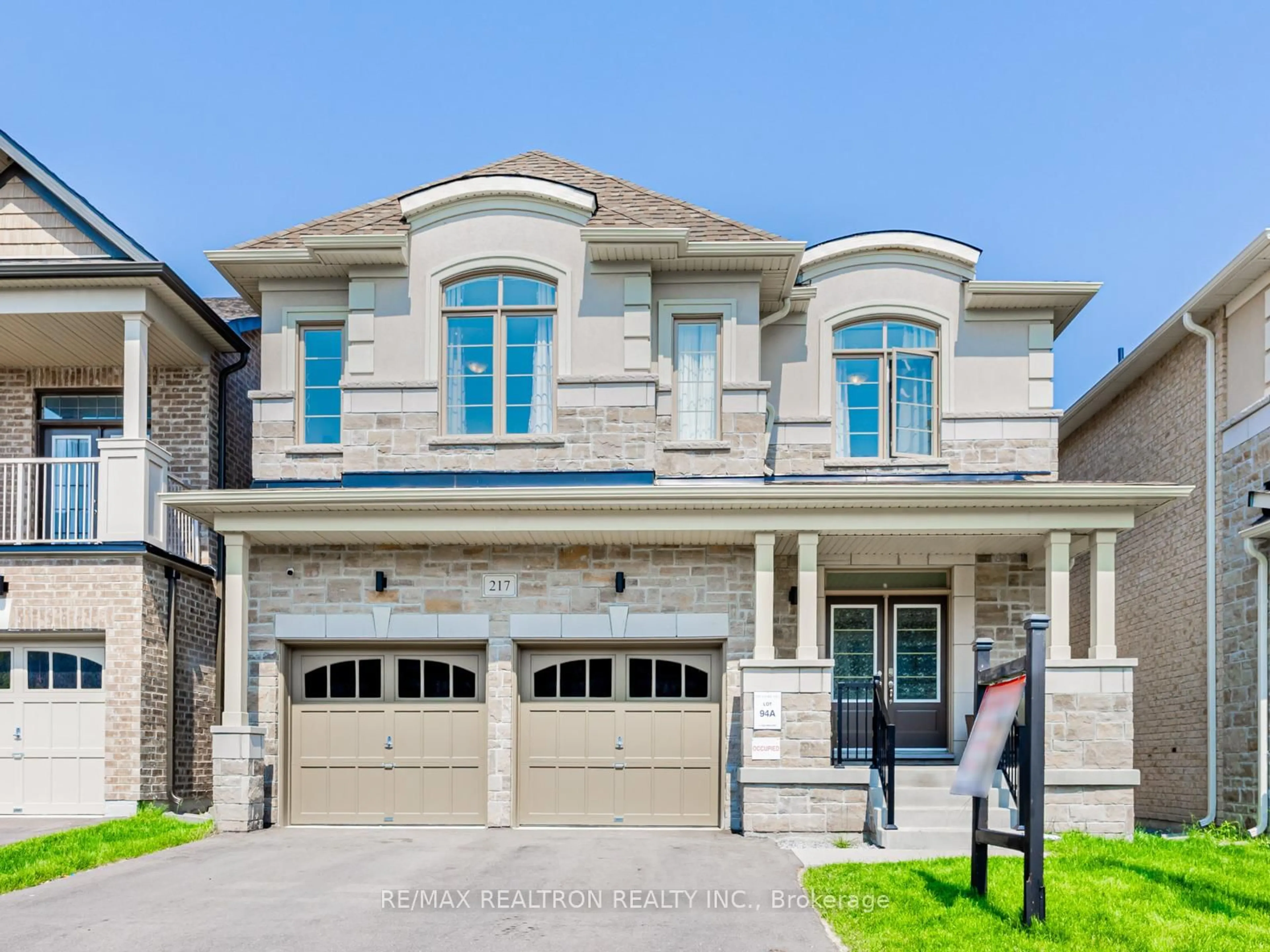 Home with brick exterior material, street for 217 Doug Finney St, Oshawa Ontario L1K 3G3