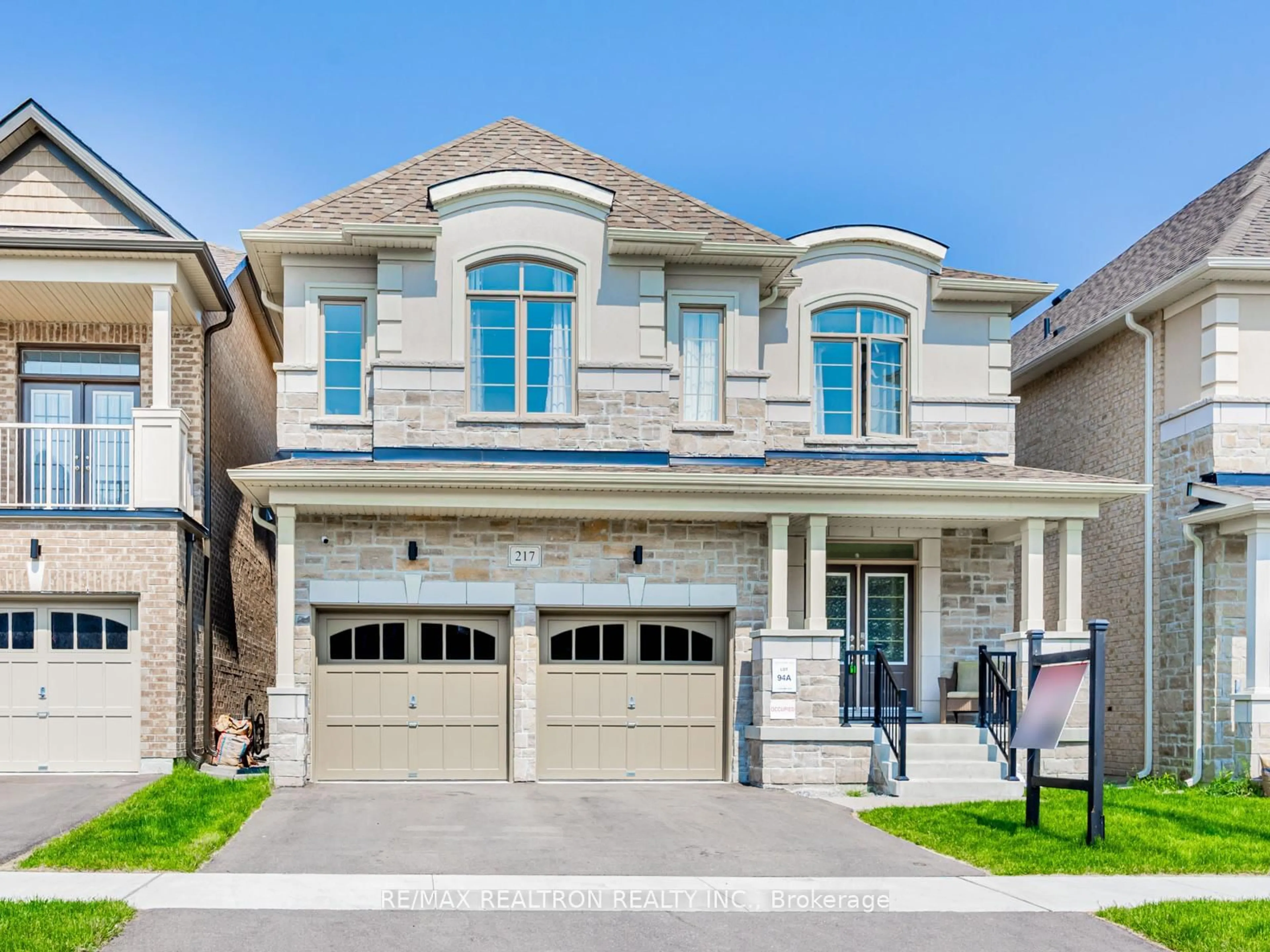Home with brick exterior material, street for 217 Doug Finney St, Oshawa Ontario L1K 3G3