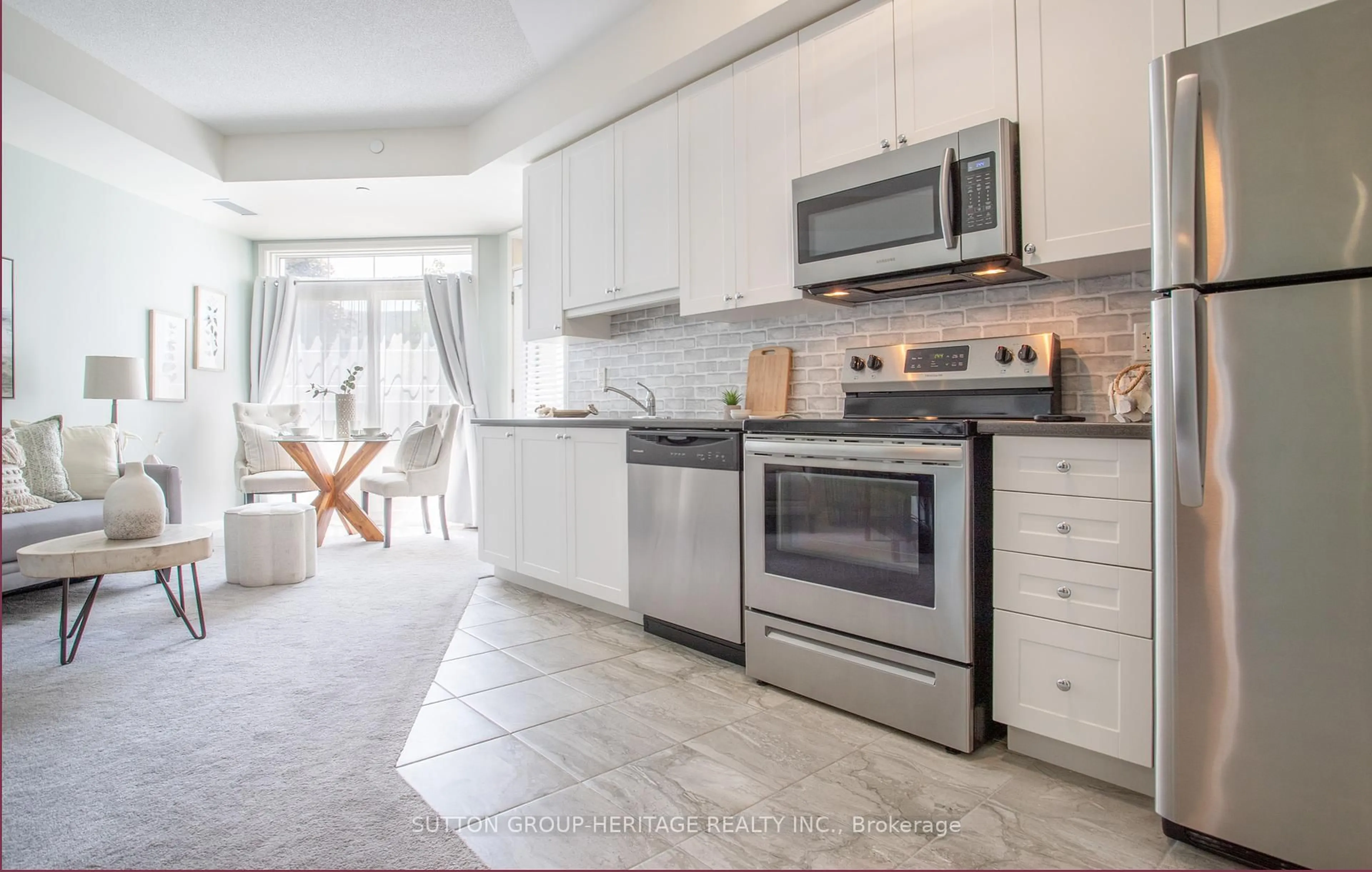 Open concept kitchen, ceramic/tile floor for 80 Aspen Springs Dr #106, Clarington Ontario L1C 0V4