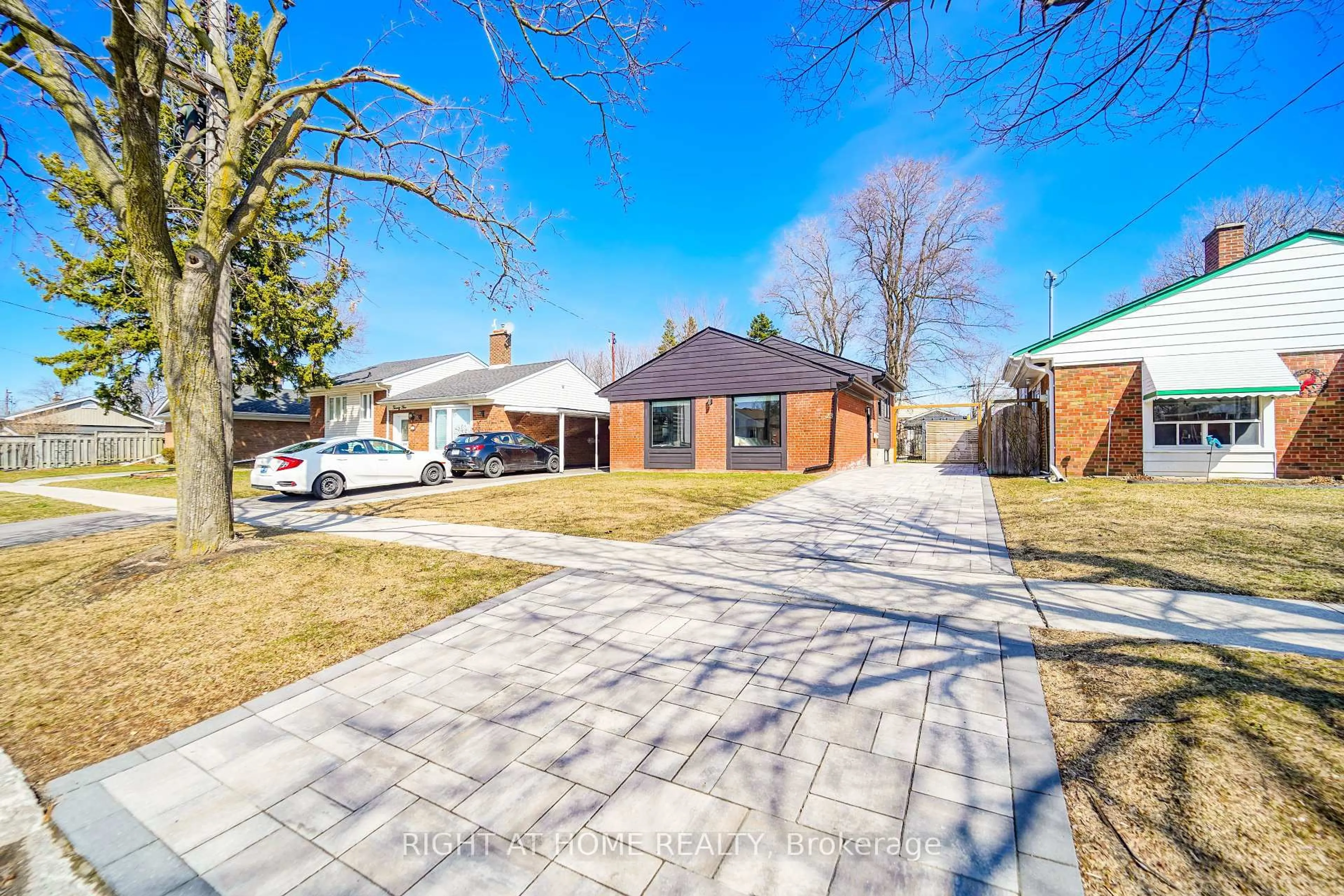 A pic from outside/outdoor area/front of a property/back of a property/a pic from drone, street for 23 Denham Rd, Toronto Ontario M1P 1W5
