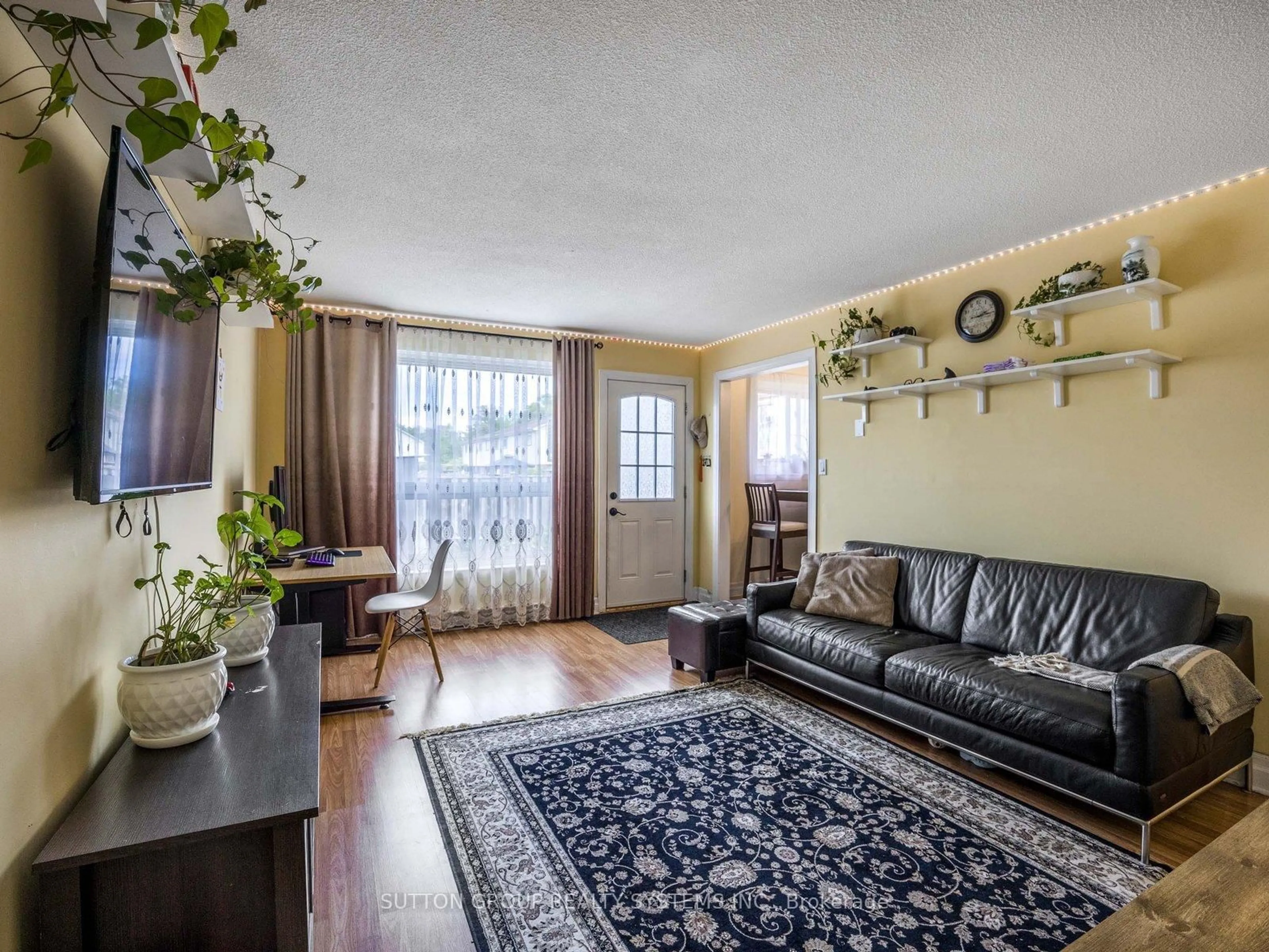 Living room with furniture, unknown for 120 Nonquon Rd #55, Oshawa Ontario L1G 7E6