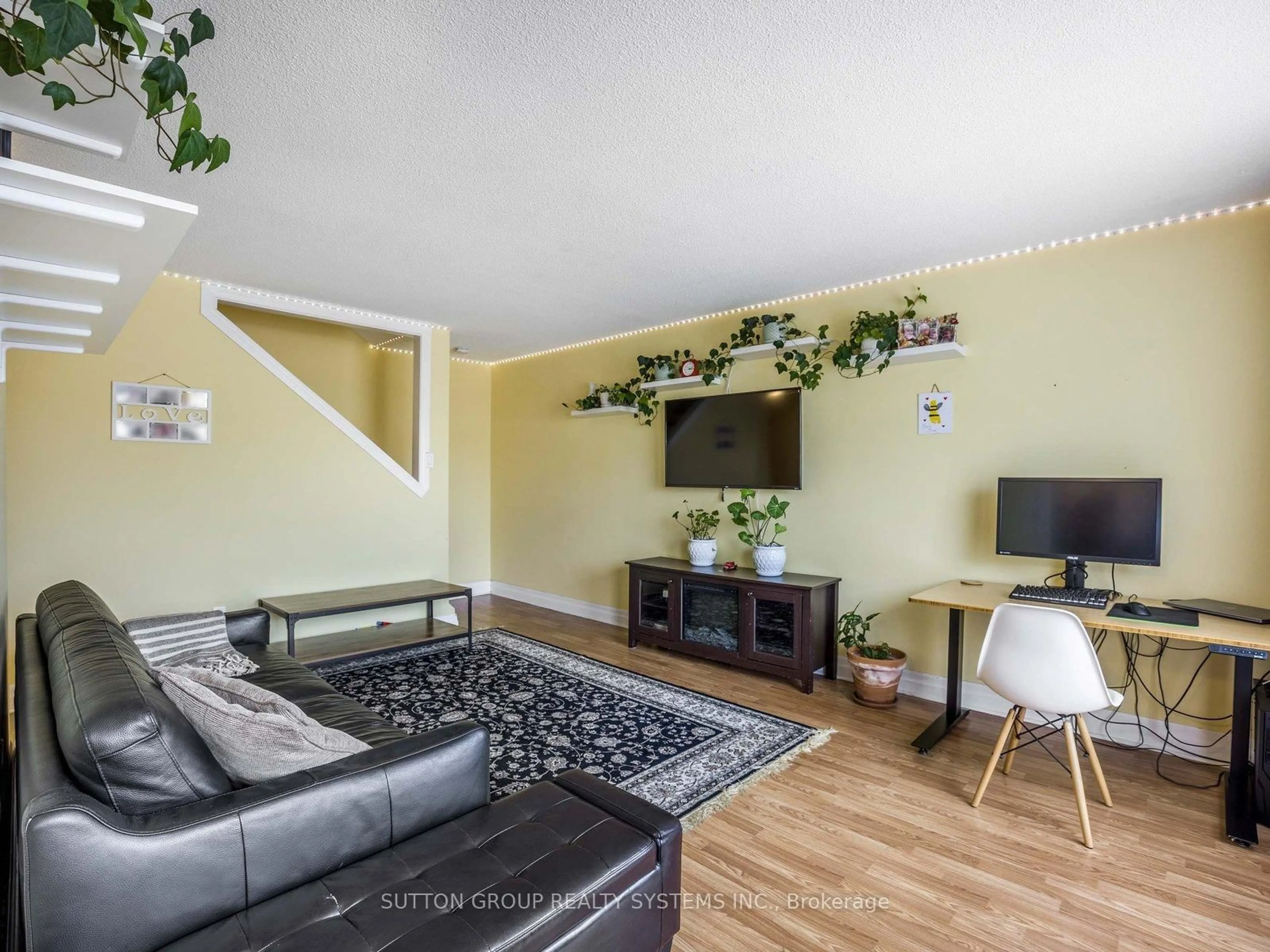 Living room with furniture, wood/laminate floor for 120 Nonquon Rd #55, Oshawa Ontario L1G 7E6