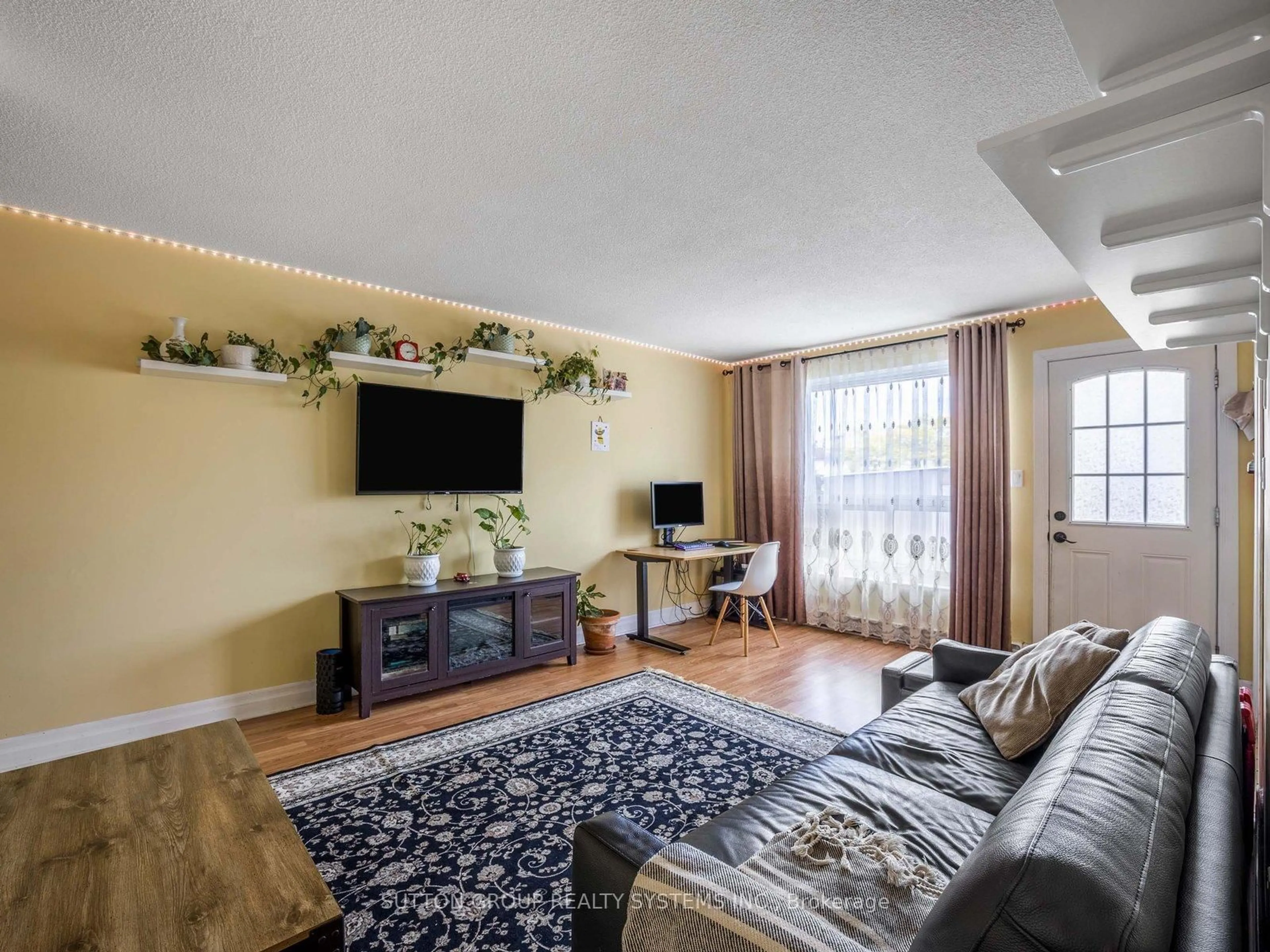 Living room with furniture, unknown for 120 Nonquon Rd #55, Oshawa Ontario L1G 7E6