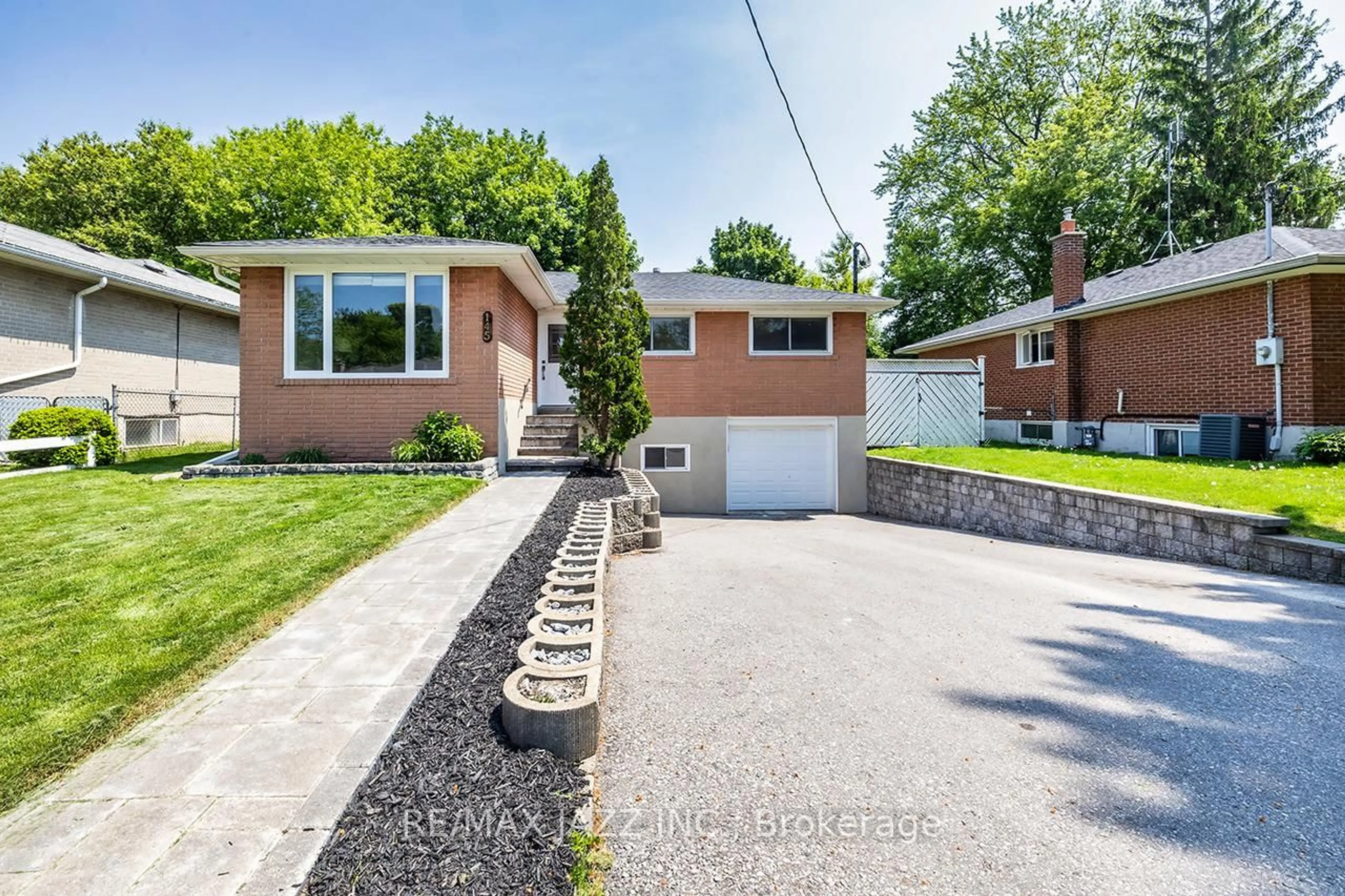 Home with brick exterior material, street for 145 Lupin Dr, Whitby Ontario L1N 1X9