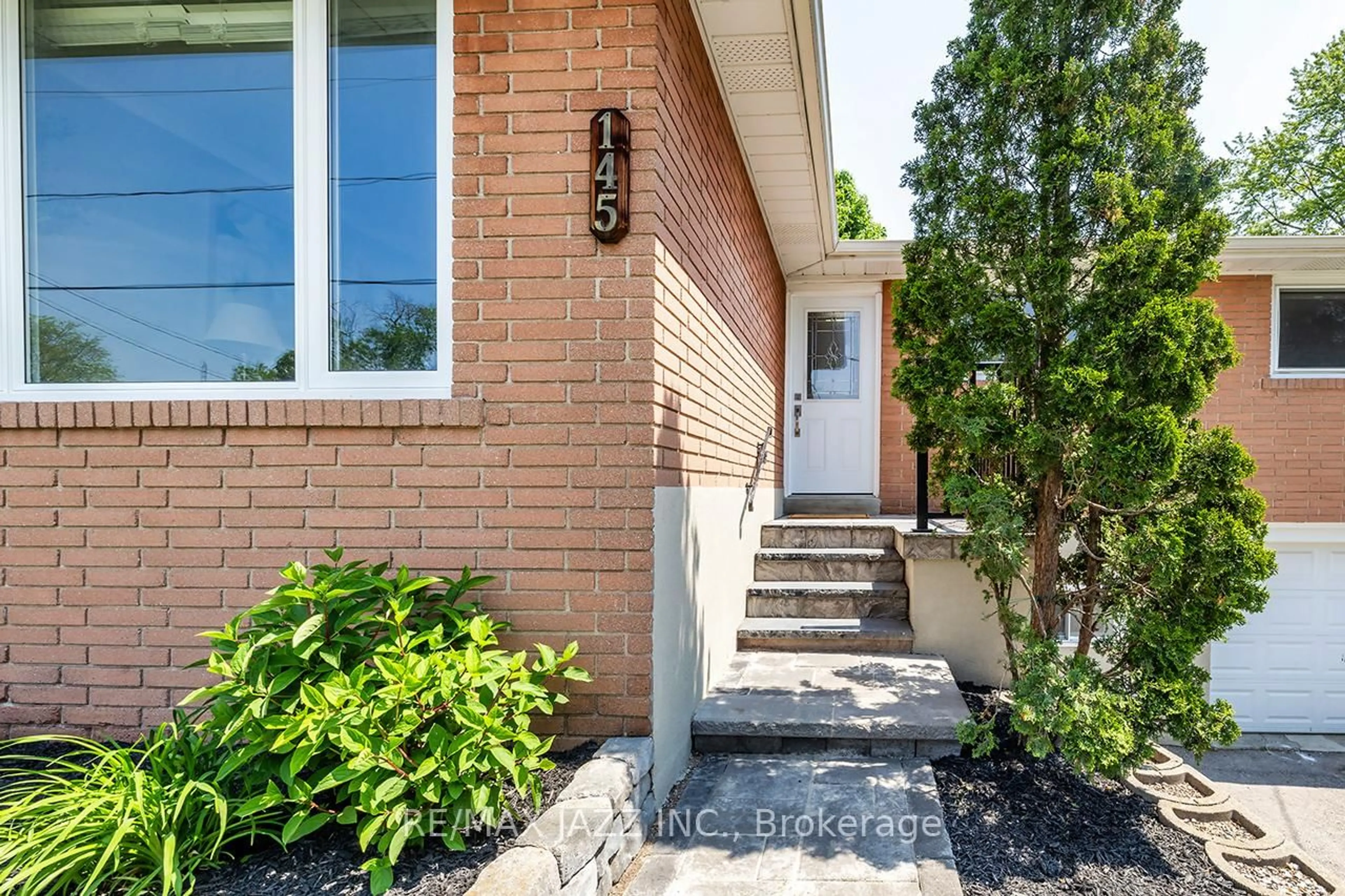 Home with brick exterior material, street for 145 Lupin Dr, Whitby Ontario L1N 1X9