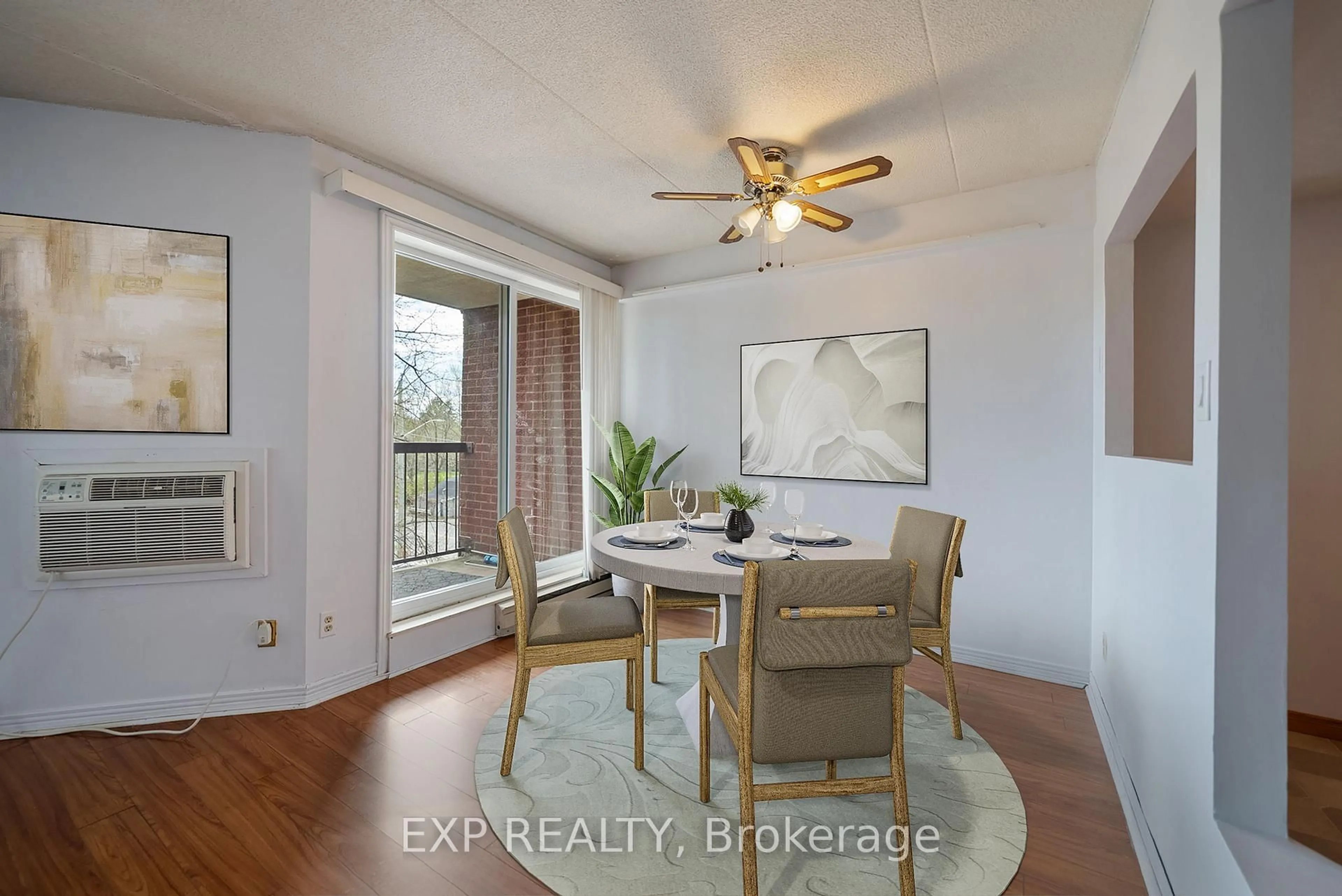 Dining room, wood/laminate floor for 144 Queen St #302, Clarington Ontario L1C 1M9