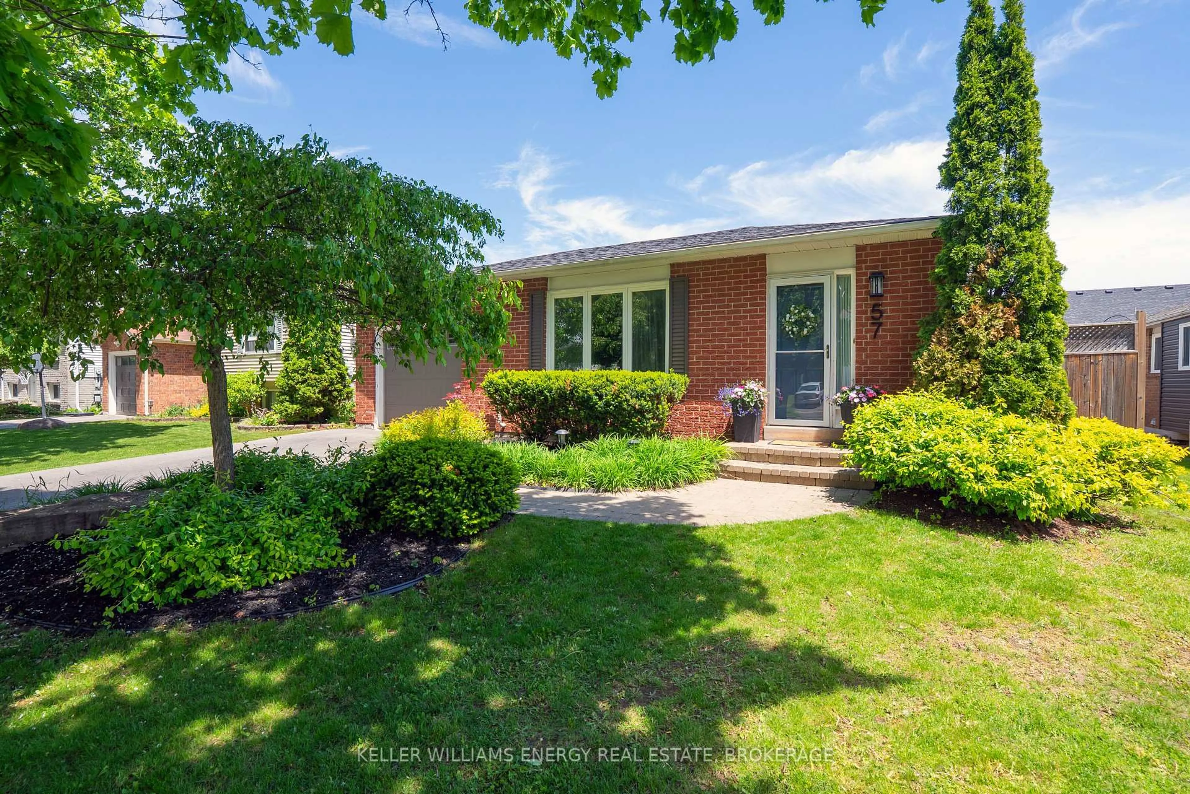 Home with brick exterior material, street for 57 Centerfield Dr, Clarington Ontario L1E 1K2
