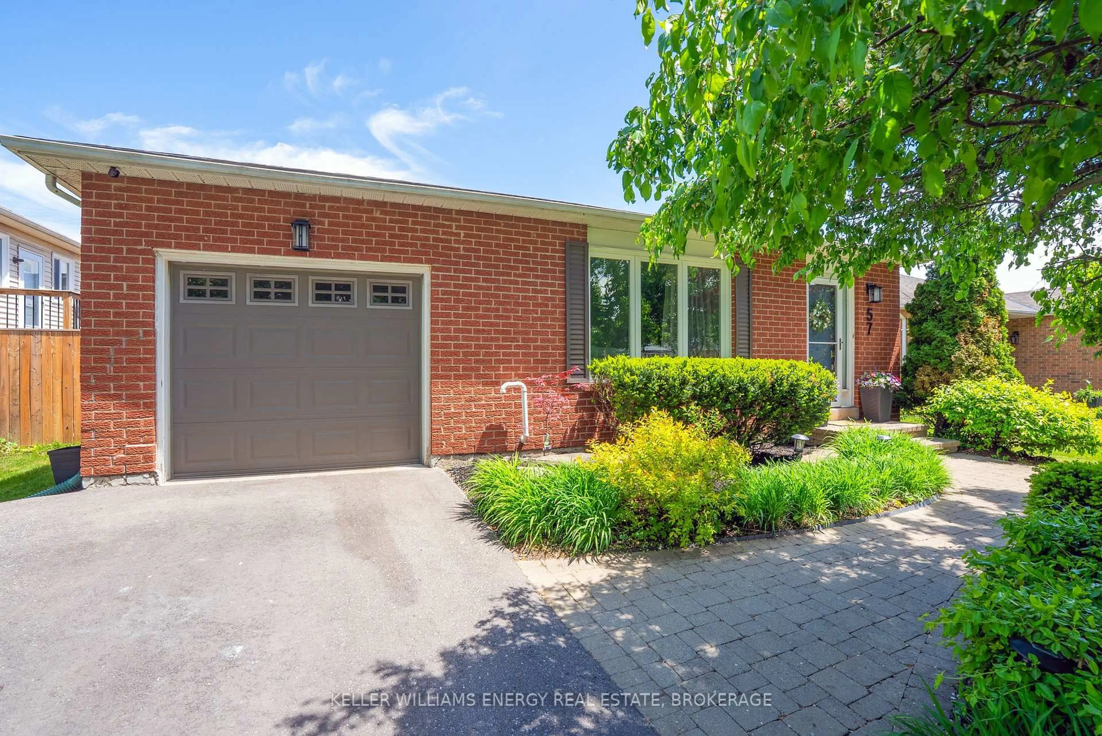 Home with brick exterior material, street for 57 Centerfield Dr, Clarington Ontario L1E 1K2