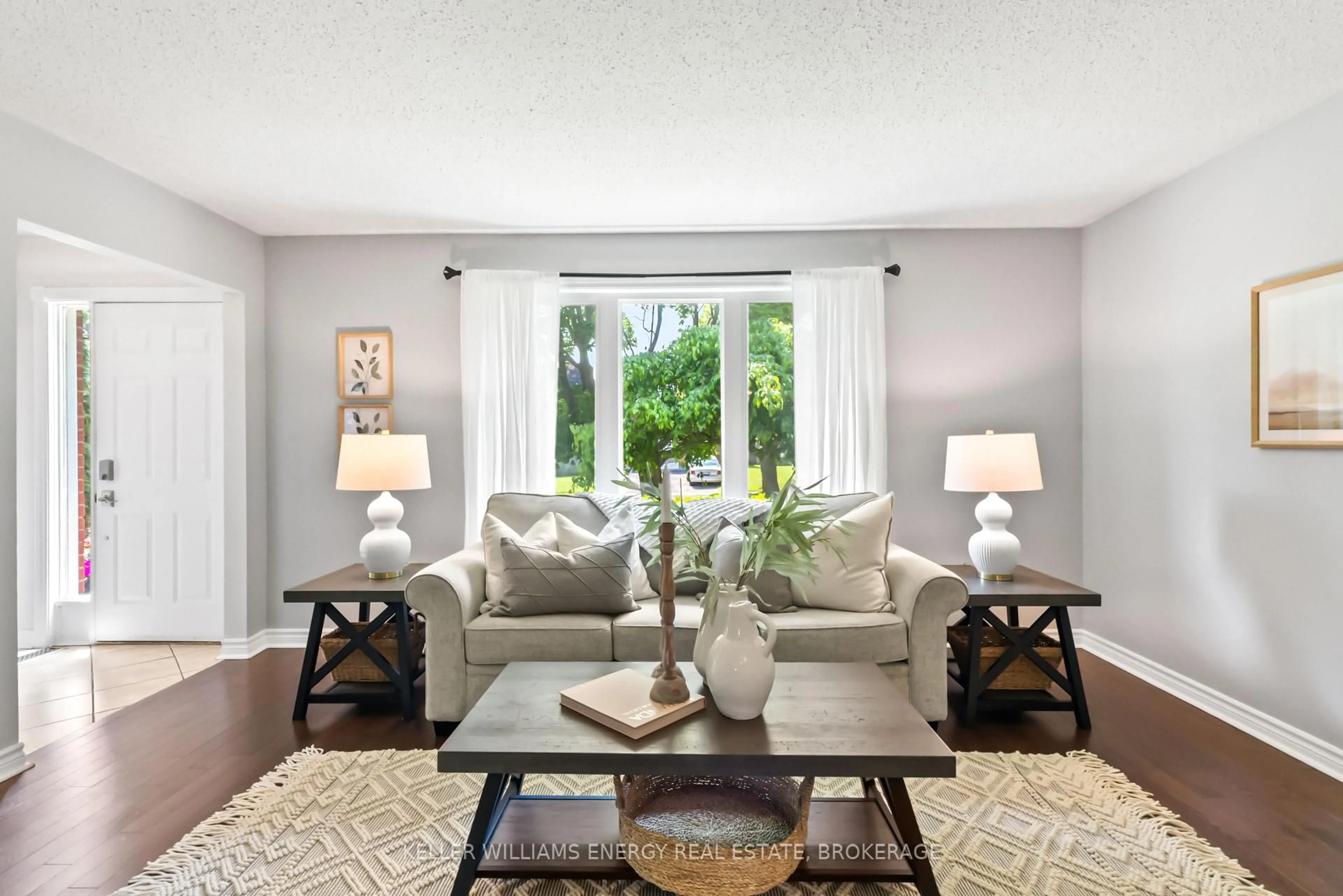 Living room with furniture, unknown for 57 Centerfield Dr, Clarington Ontario L1E 1K2
