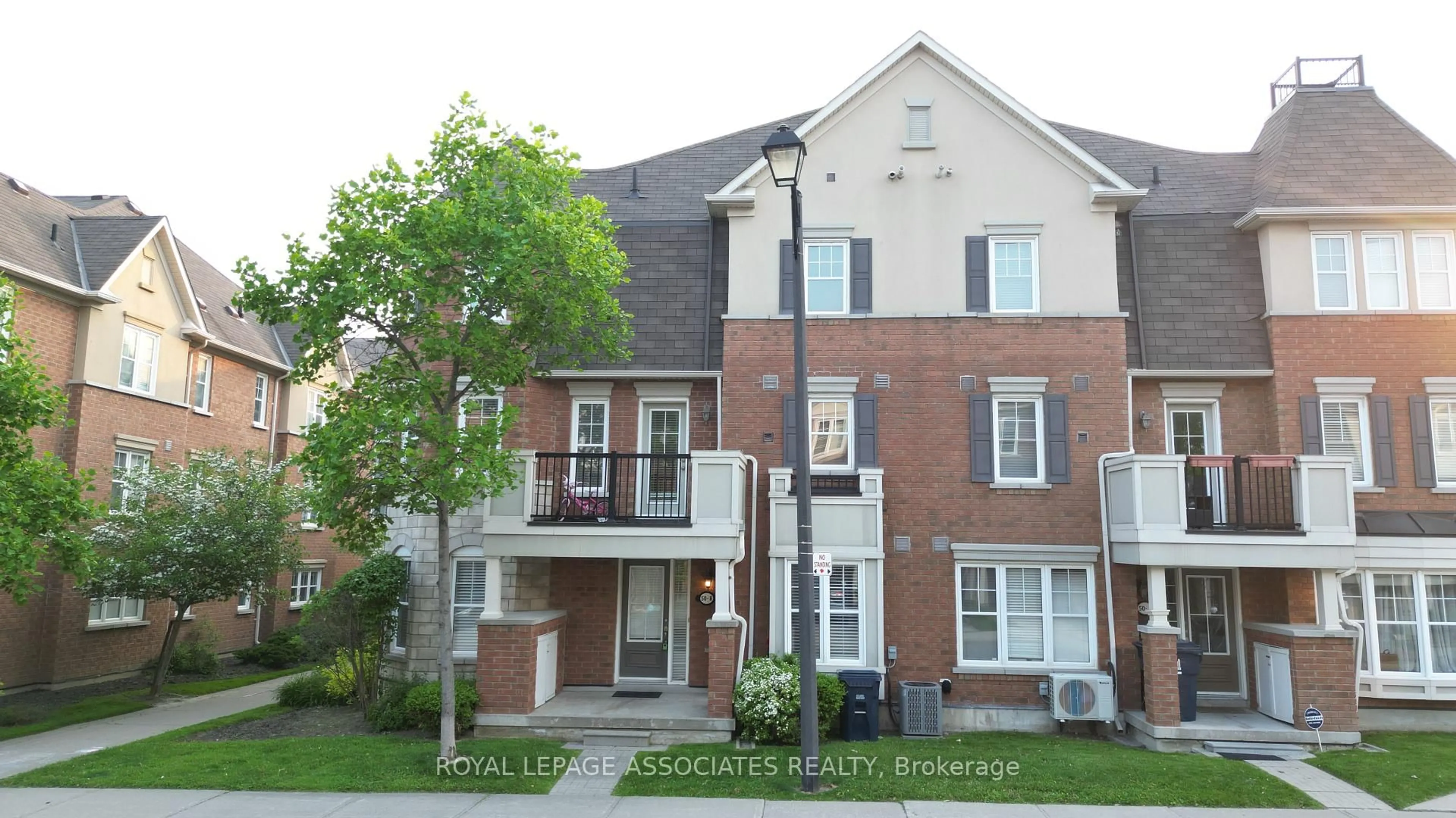 Home with brick exterior material, street for 50 Mendelssohn St #8, Toronto Ontario M1L 0G8