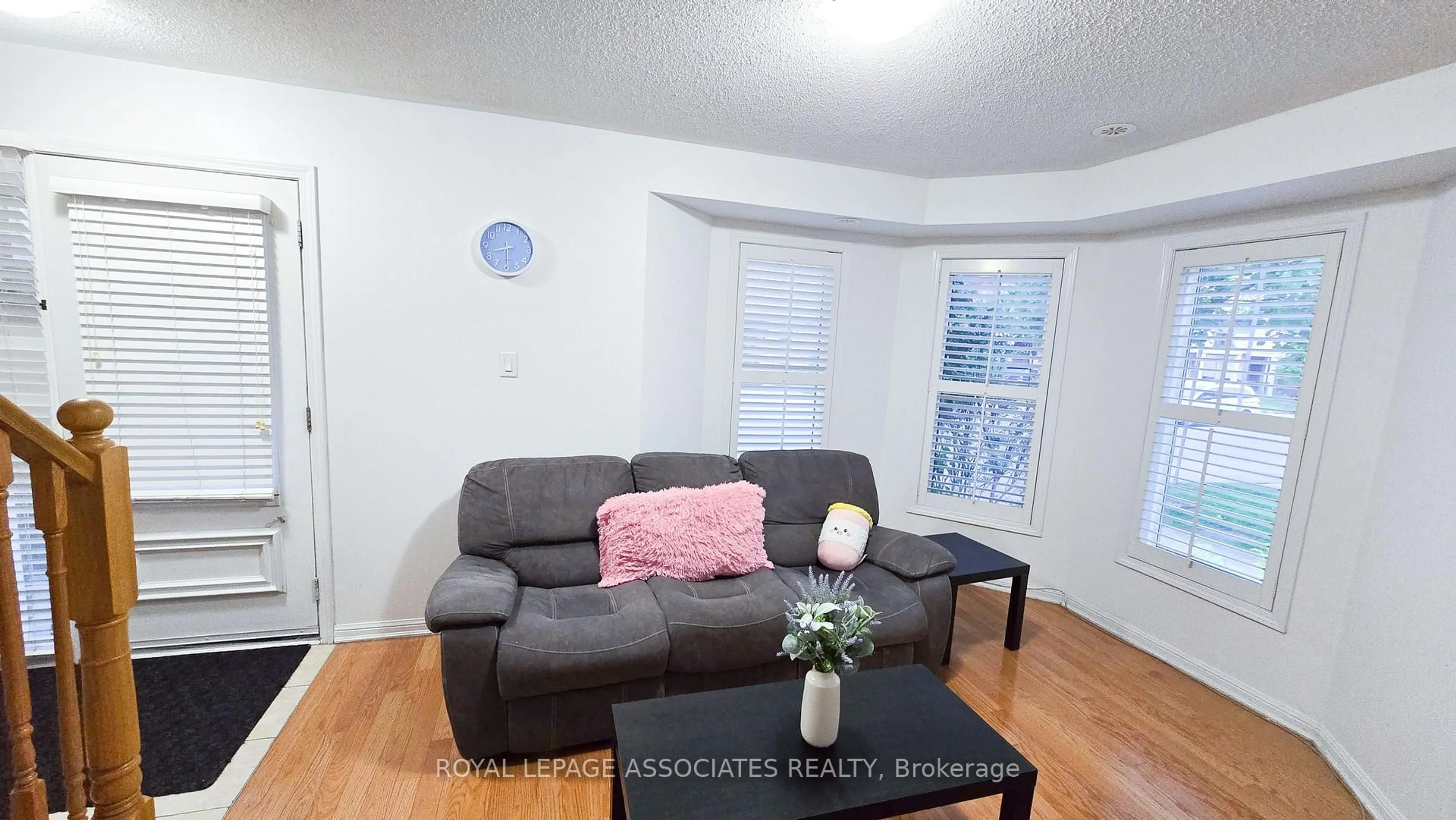 Living room with furniture, wood/laminate floor for 50 Mendelssohn St #8, Toronto Ontario M1L 0G8