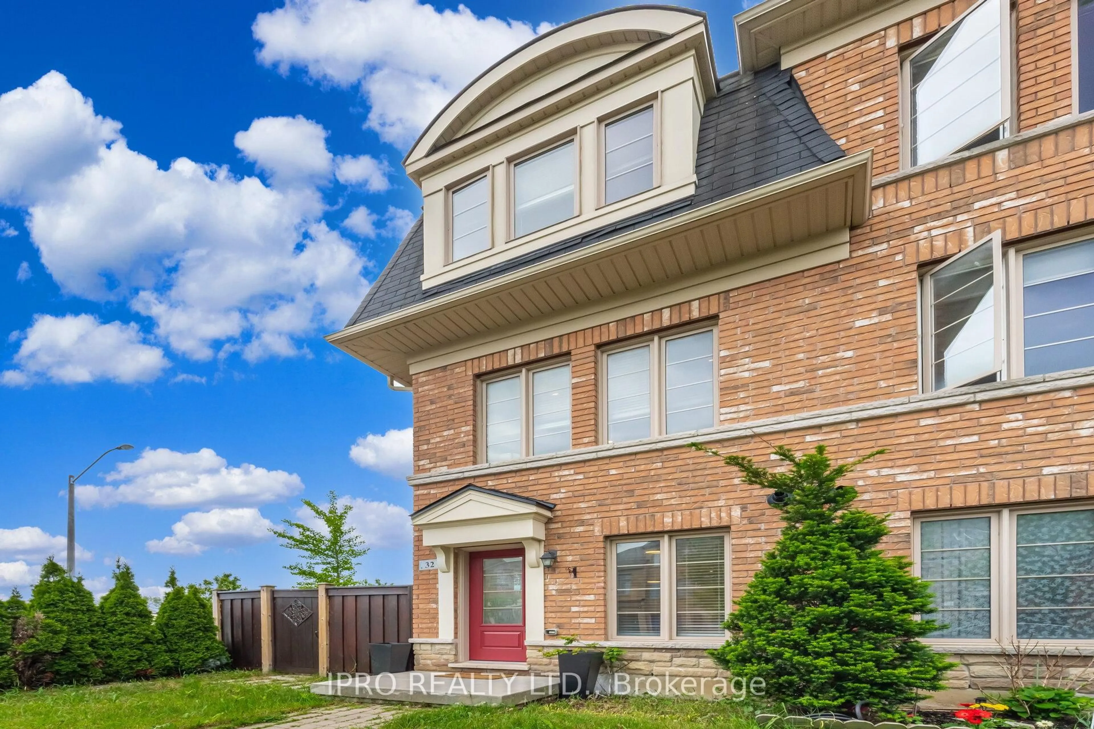 Home with brick exterior material, street for 32 Lily Cup Ave, Toronto Ontario M1L 0H4