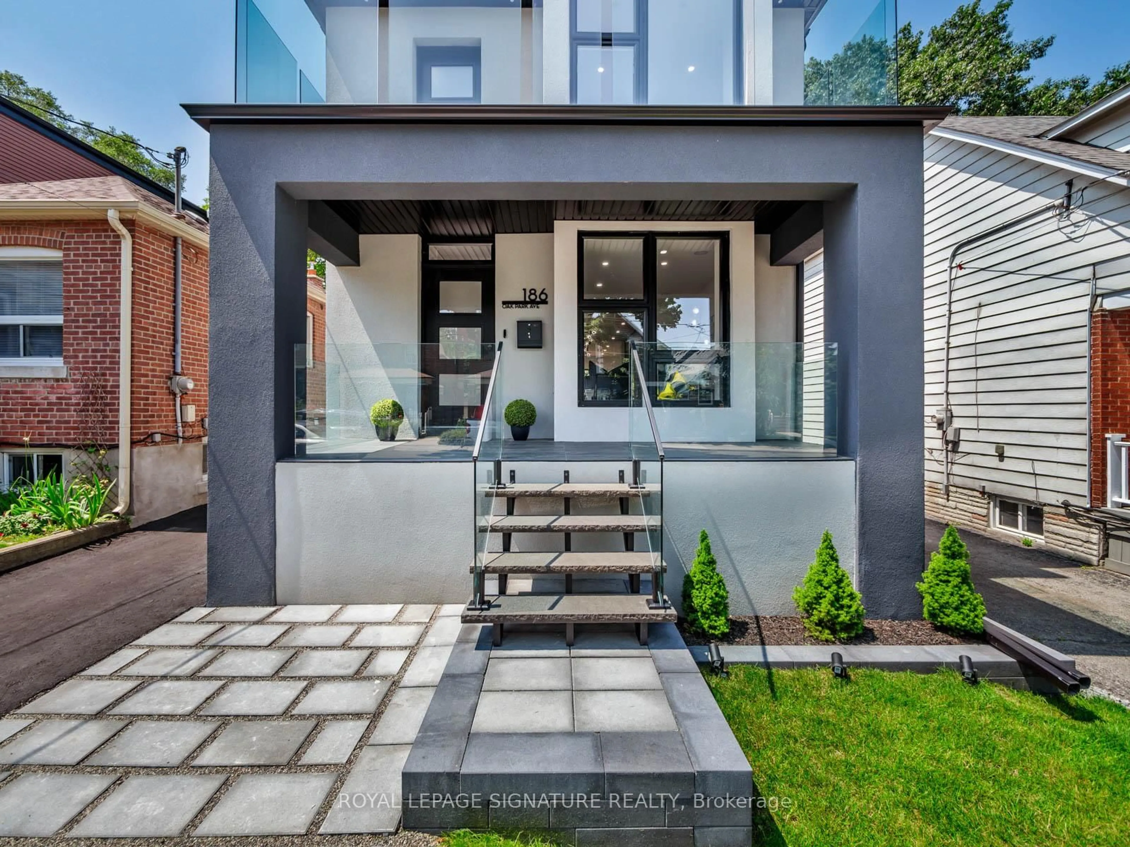 Home with brick exterior material, street for 186 Oak Park Ave, Toronto Ontario M4C 4M8
