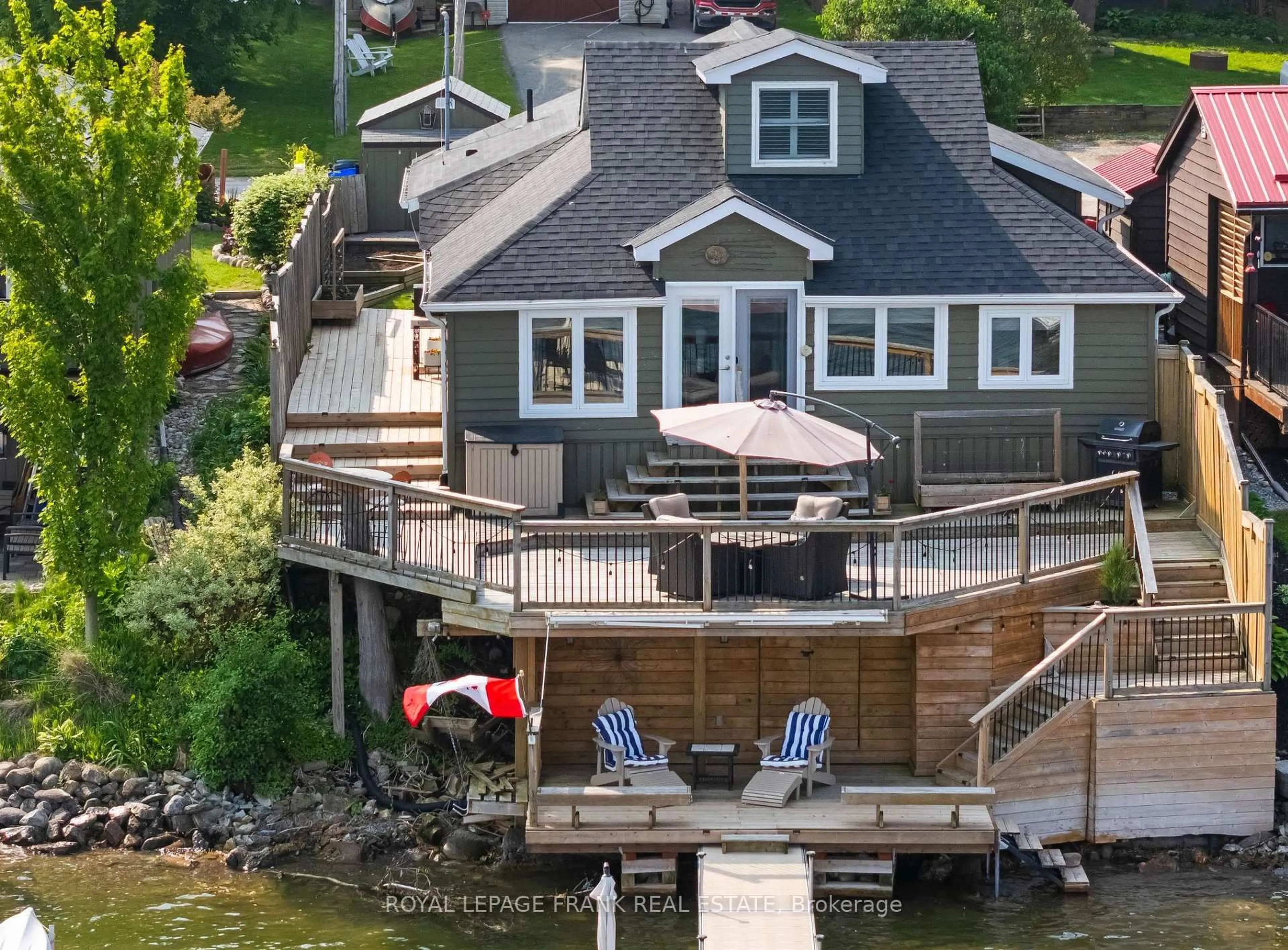 A pic from outside/outdoor area/front of a property/back of a property/a pic from drone, water/lake/river/ocean view for 264 Williams Point Rd, Scugog Ontario L0B 1E0