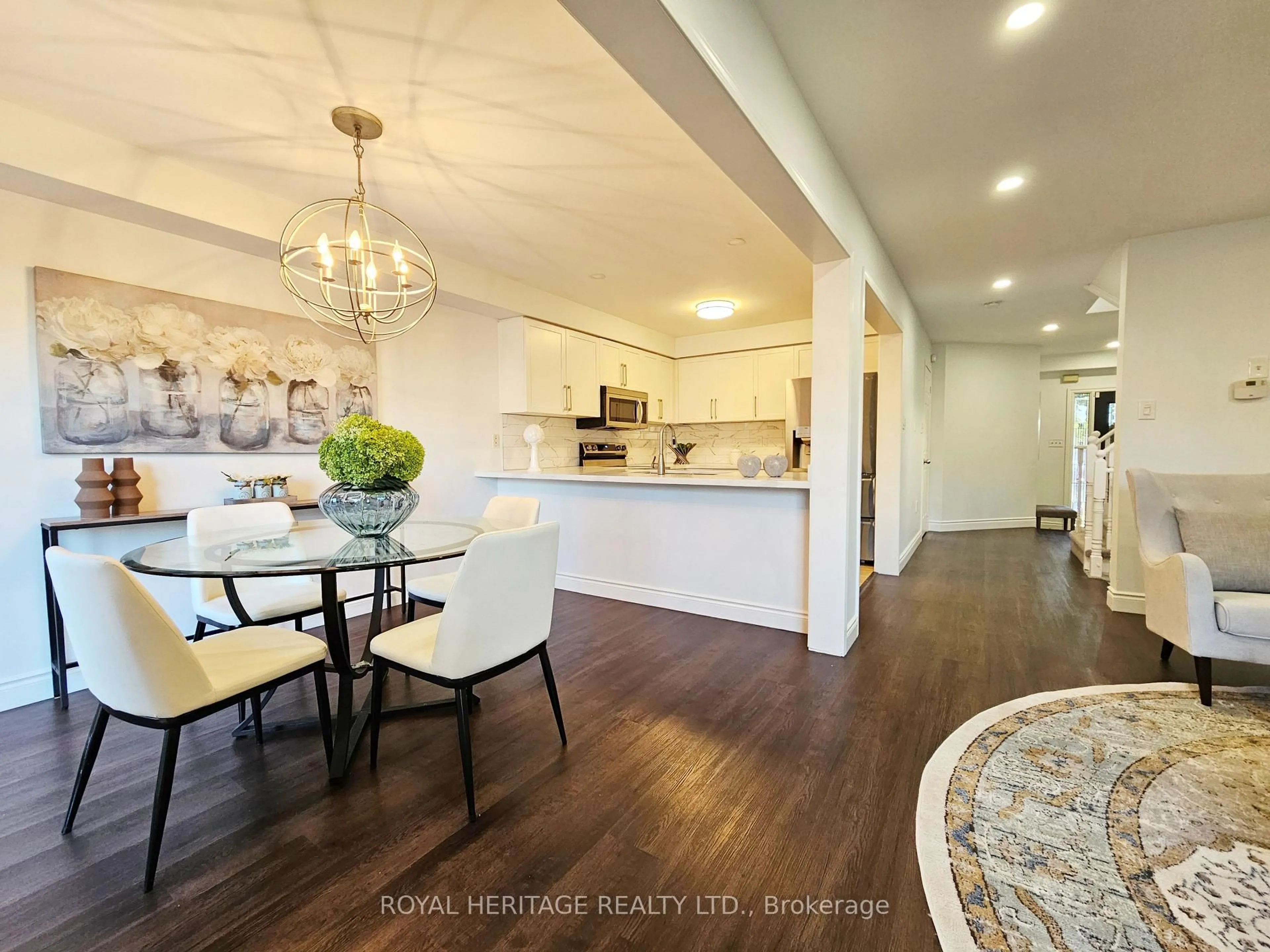 Open concept kitchen, wood/laminate floor for 56 Catkins Cres, Whitby Ontario L1R 2Z8