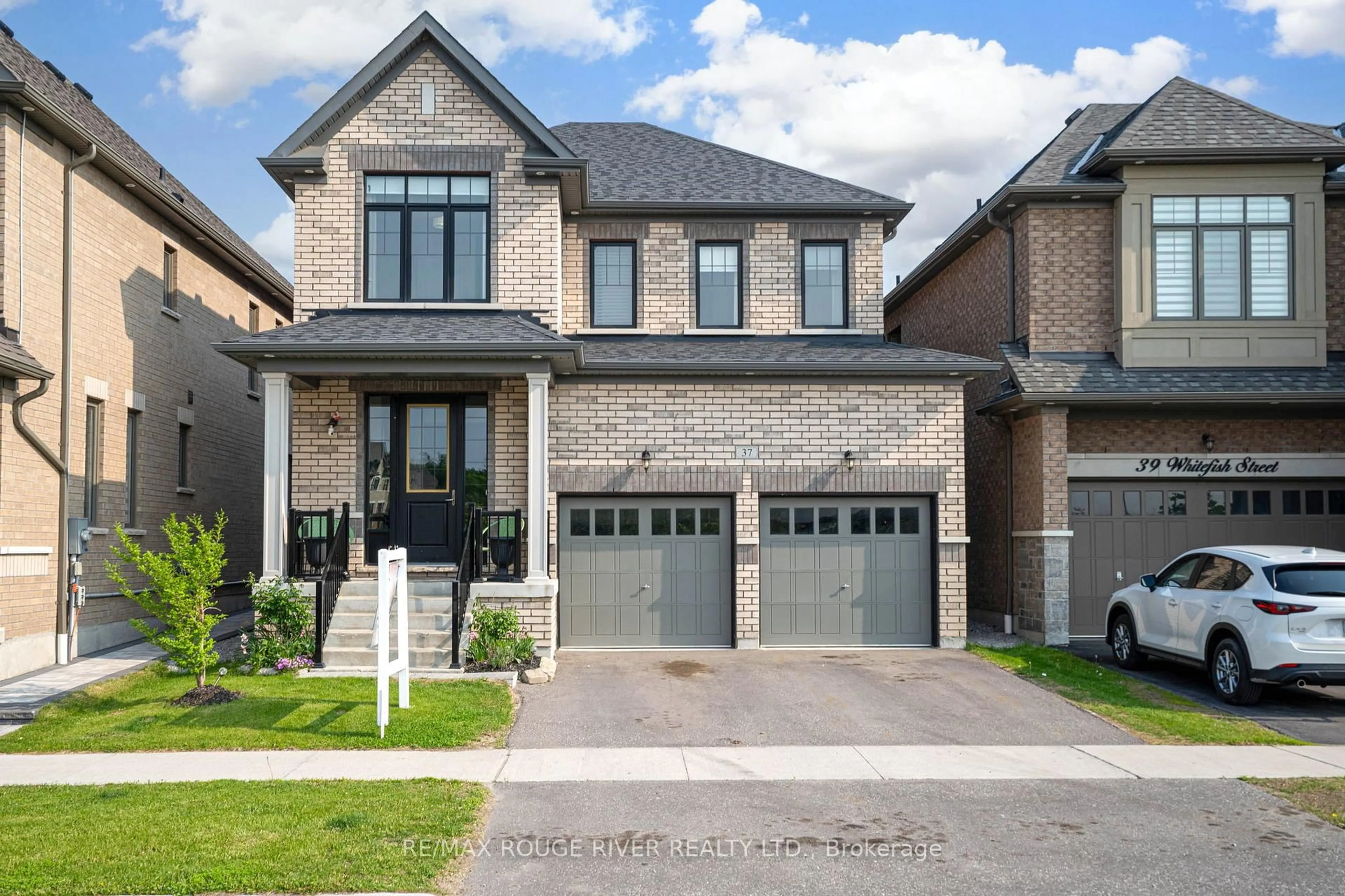 Home with brick exterior material, street for 37 Whitefish St, Whitby Ontario L1P 0K5