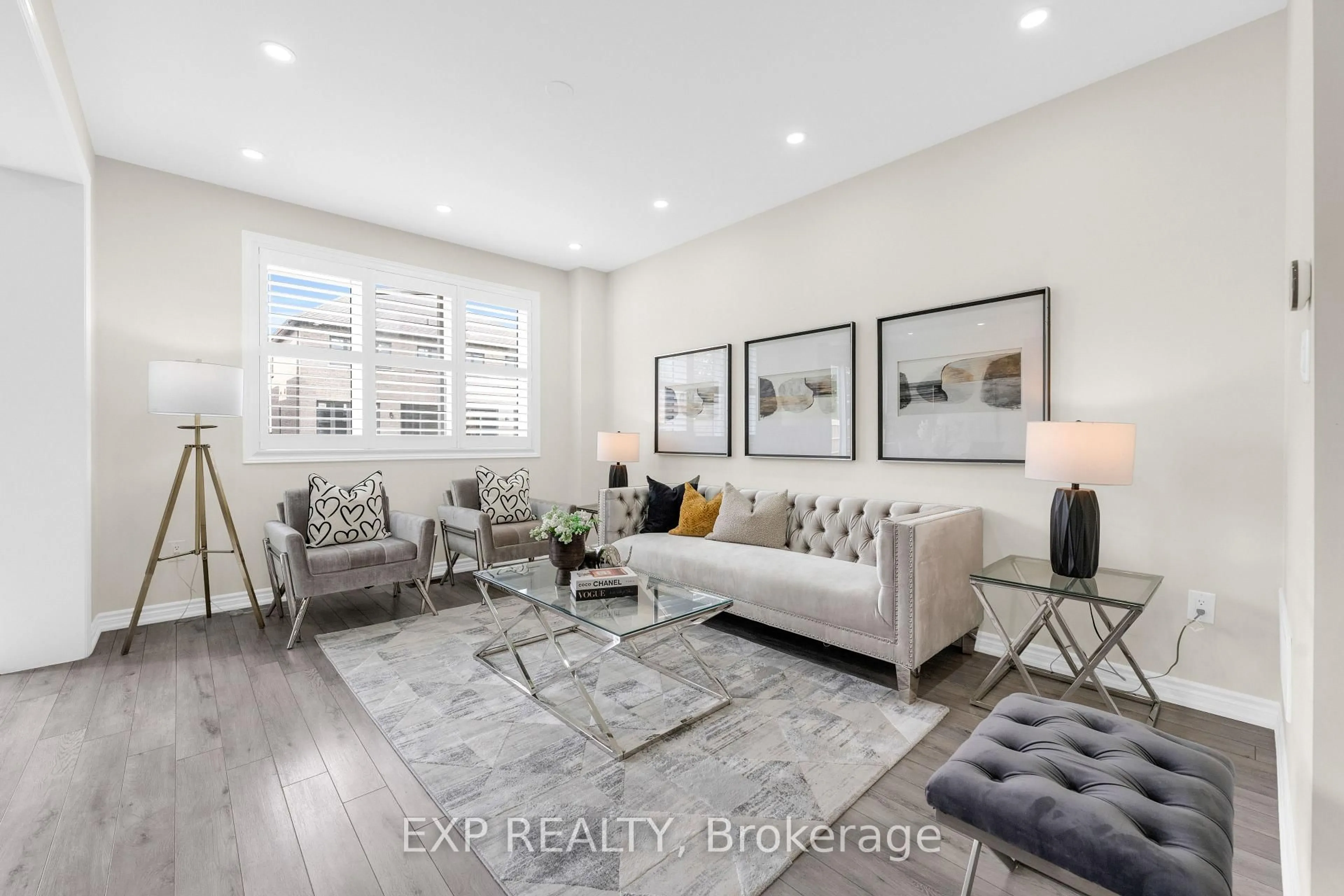 Living room with furniture, wood/laminate floor for 98 Lockyer Dr, Whitby Ontario L1P 0M3