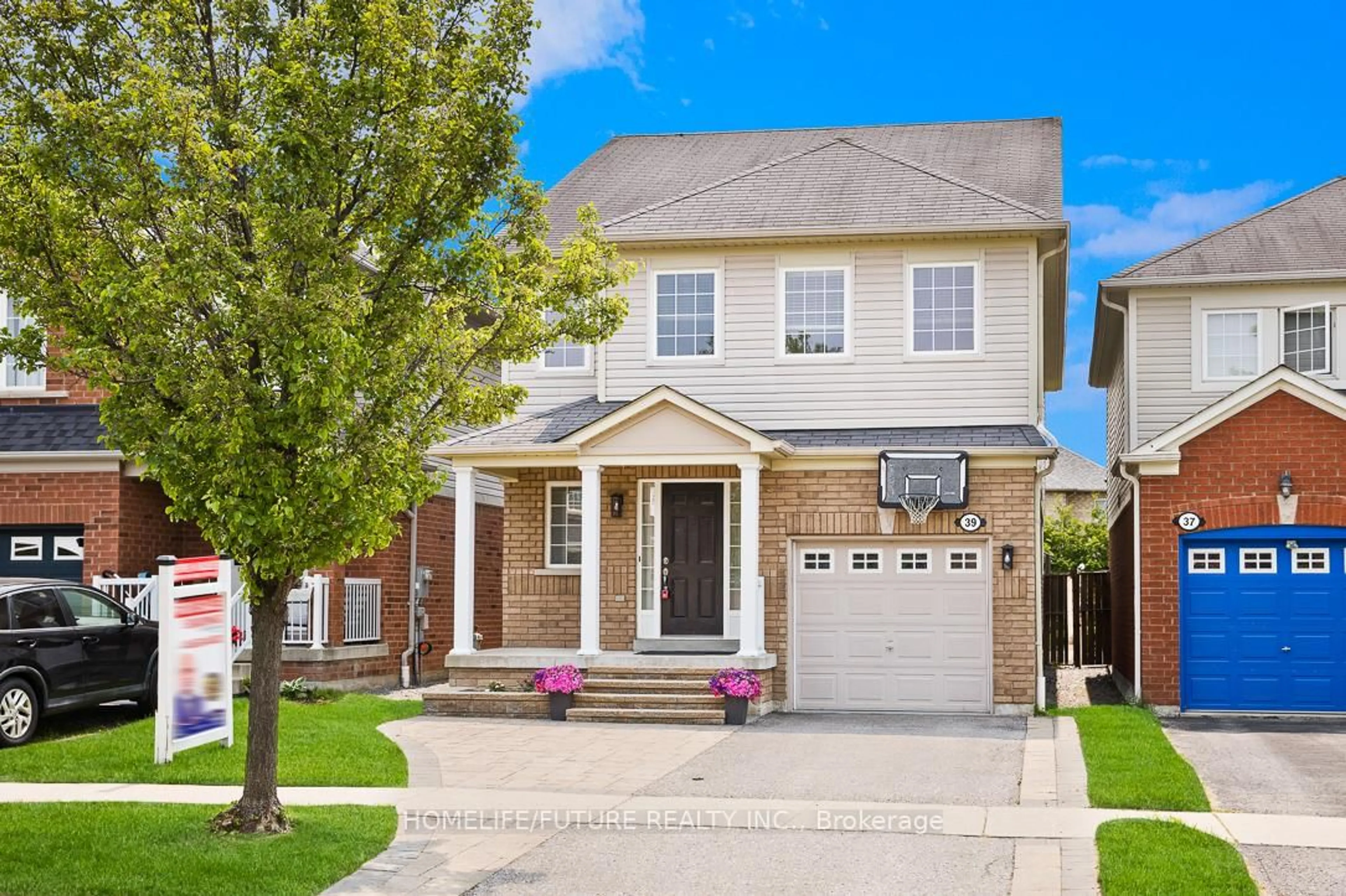 Home with brick exterior material, street for 39 Harkness Dr, Whitby Ontario L1R 0C5