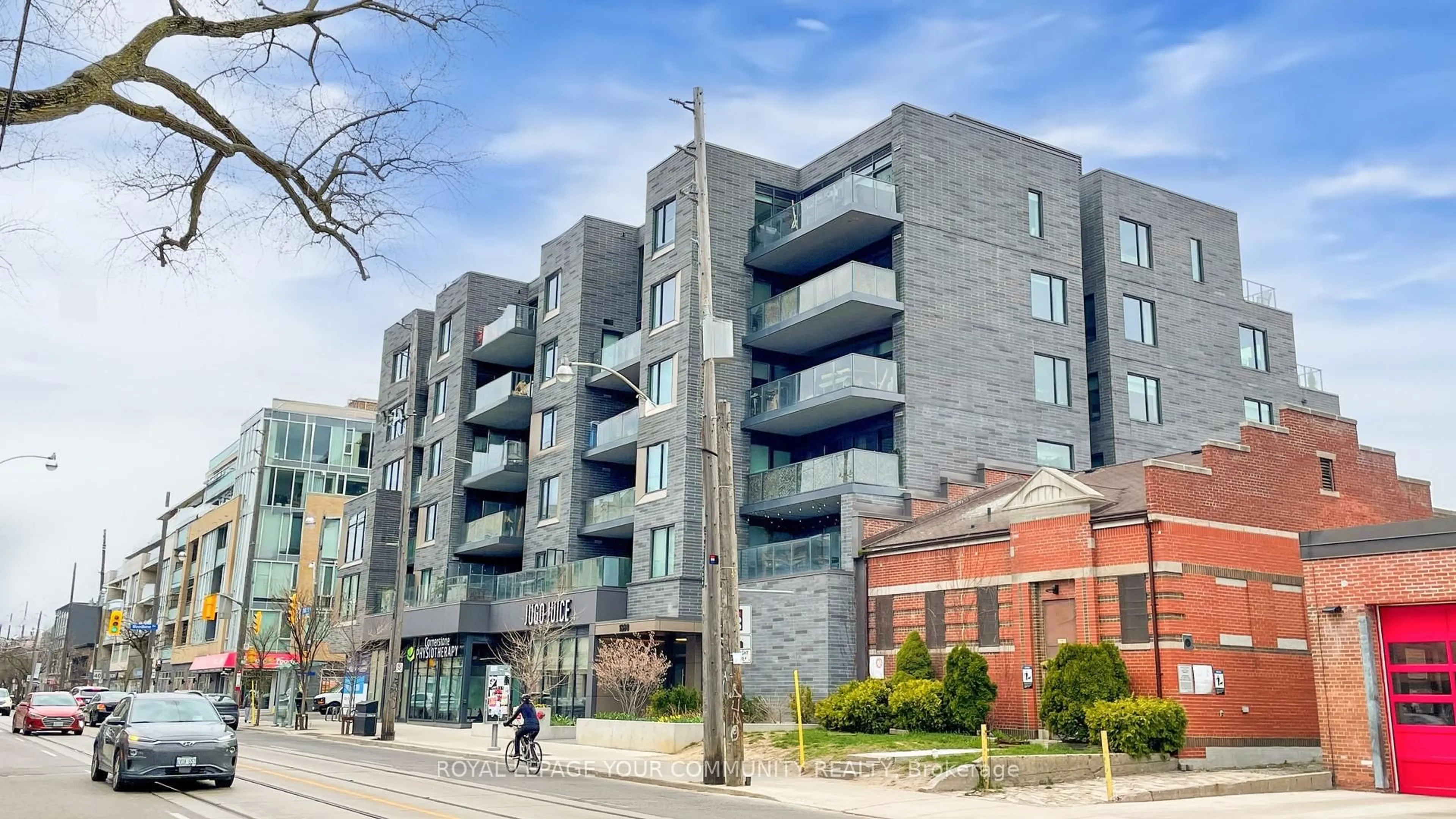 A pic from outside/outdoor area/front of a property/back of a property/a pic from drone, building for 1888 Queen St #307, Toronto Ontario M4L 1H3