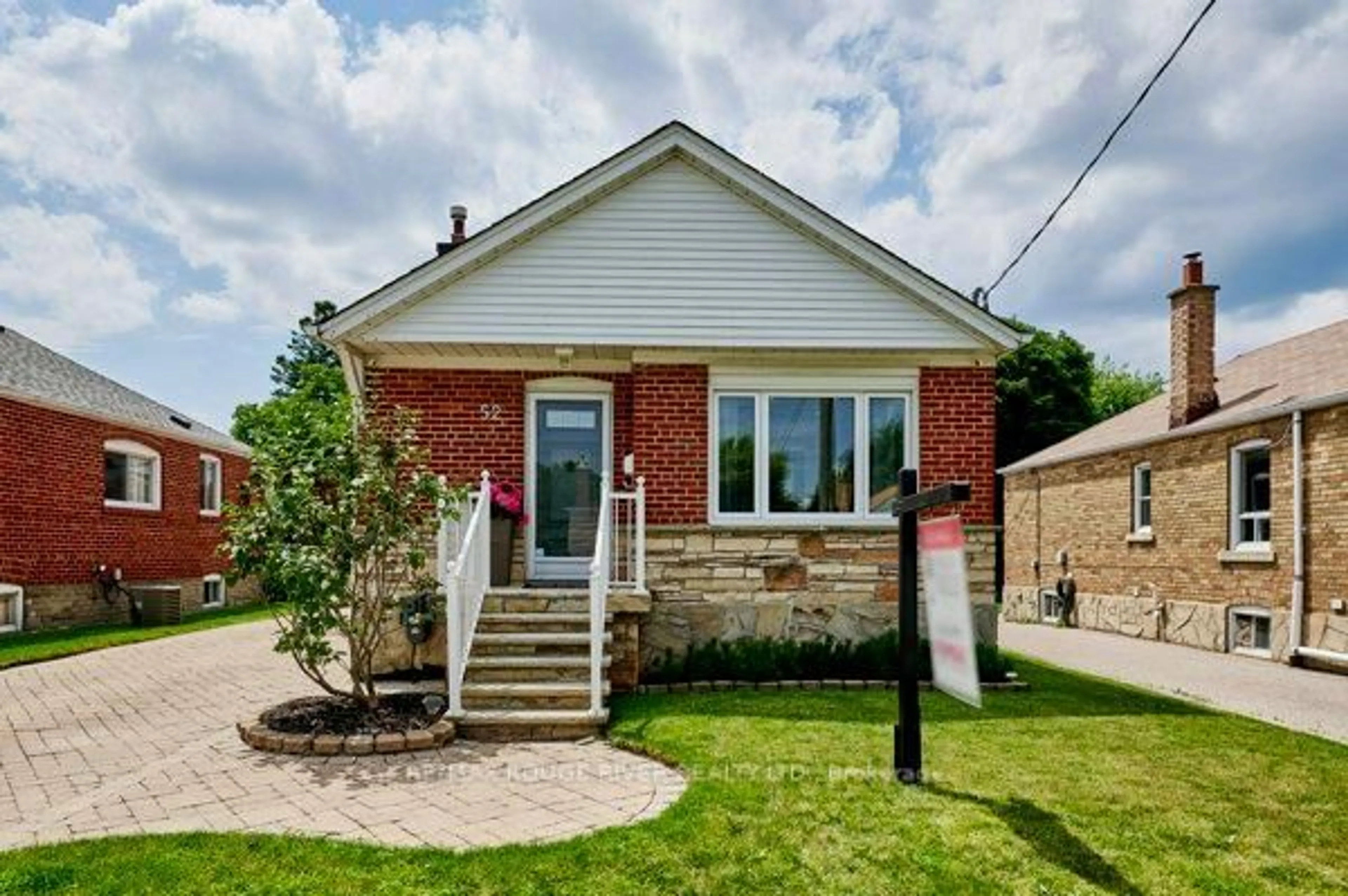 Home with brick exterior material, street for 52 Marsh Rd, Toronto Ontario M1K 1Y9