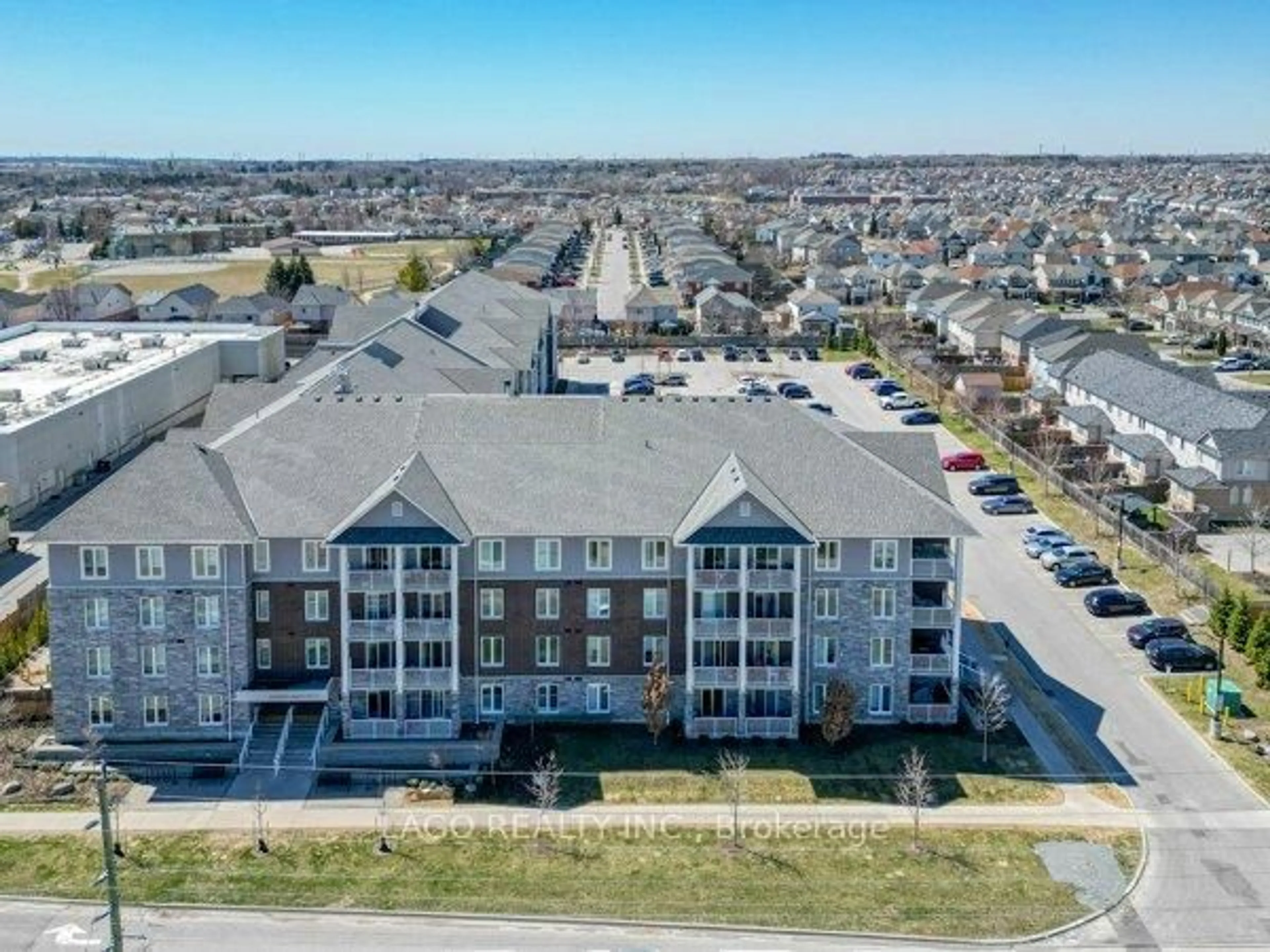 A pic from outside/outdoor area/front of a property/back of a property/a pic from drone, unknown for 290 Liberty St #217, Clarington Ontario L1C 0V5