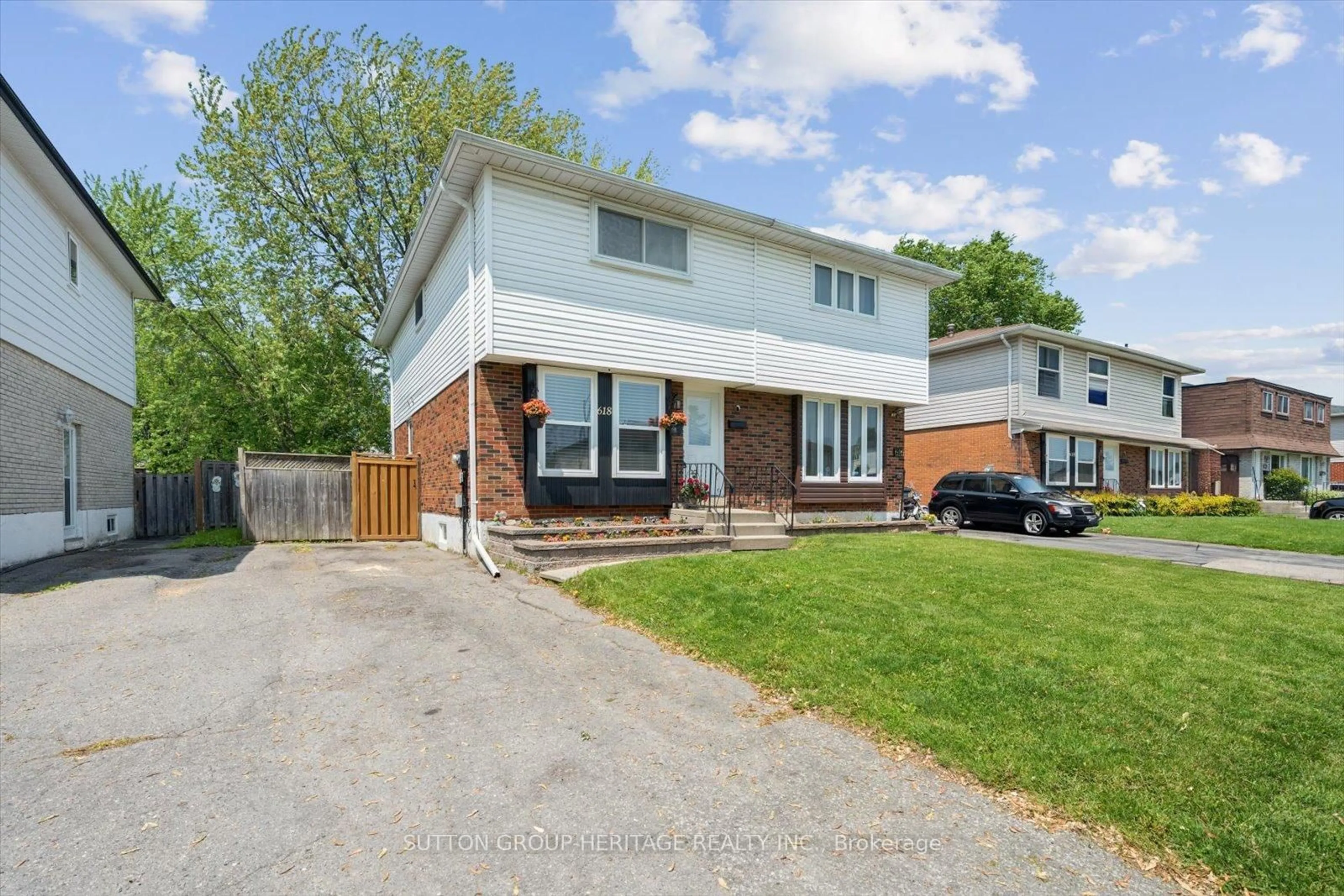 Home with brick exterior material, street for 618 Radisson Ave, Oshawa Ontario L1J 1X8