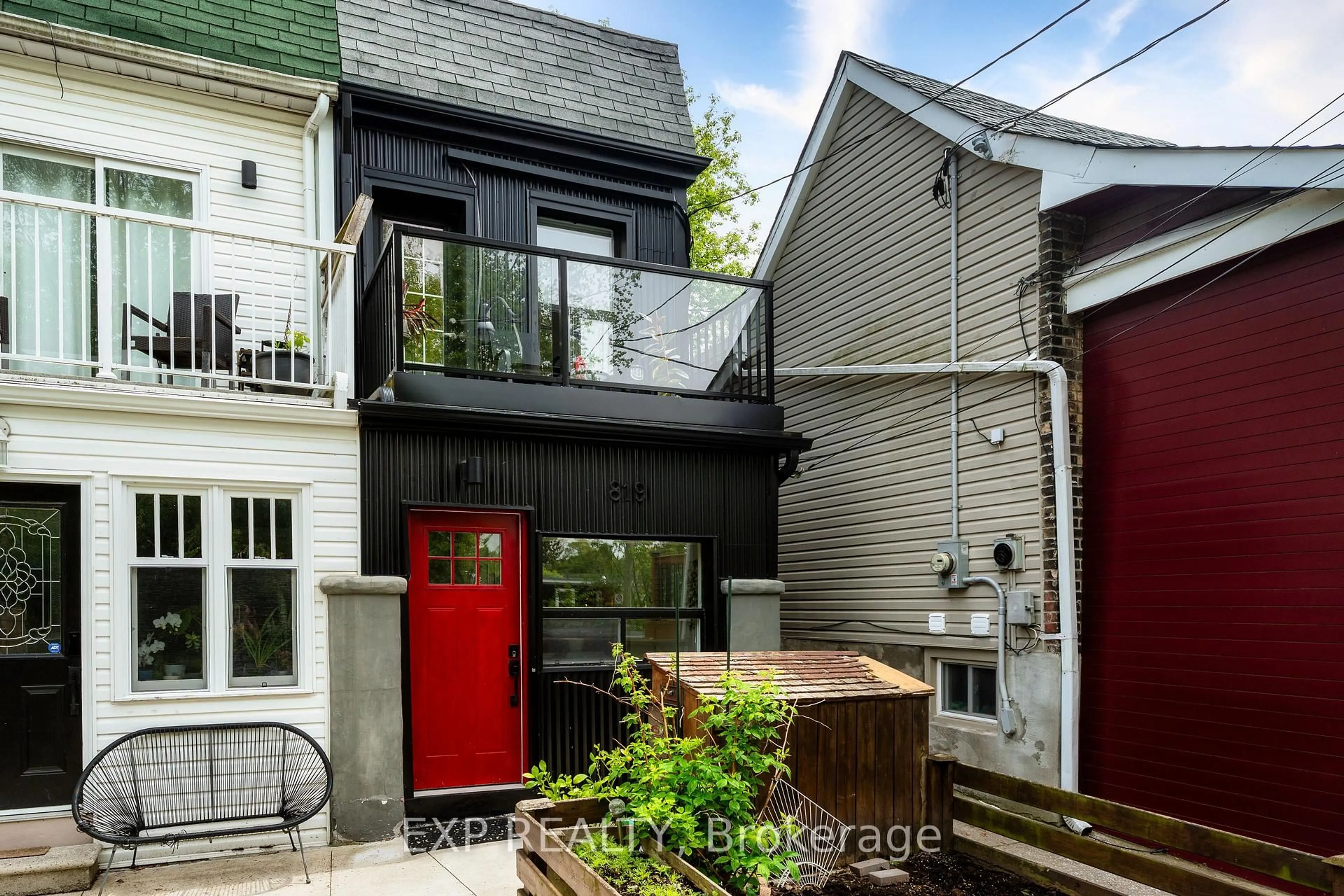 Home with brick exterior material, street for 819 Craven Rd, Toronto Ontario M4L 2Z7