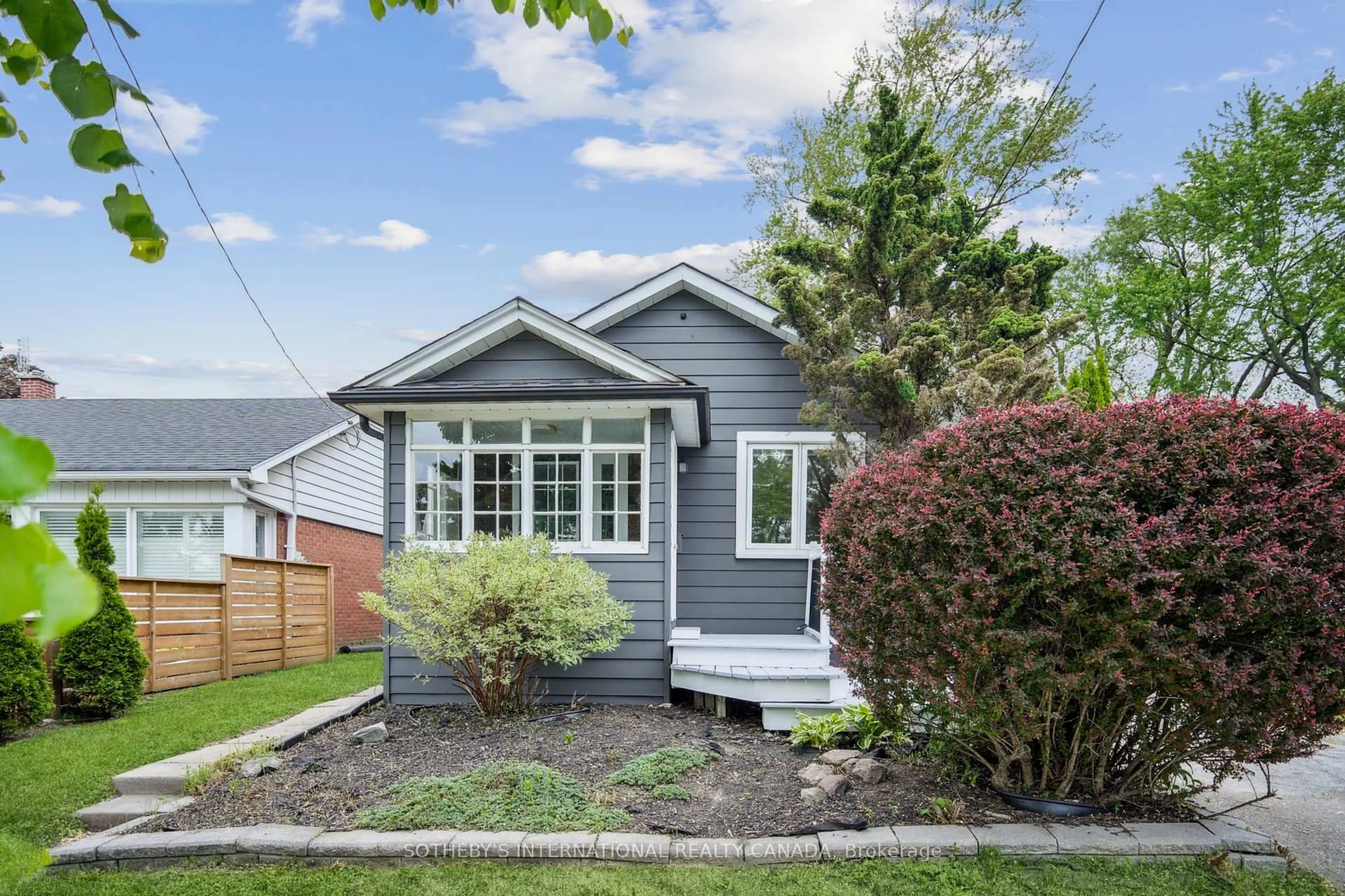Home with vinyl exterior material, street for 3722 St. Clair Ave, Toronto Ontario M1M 1T6