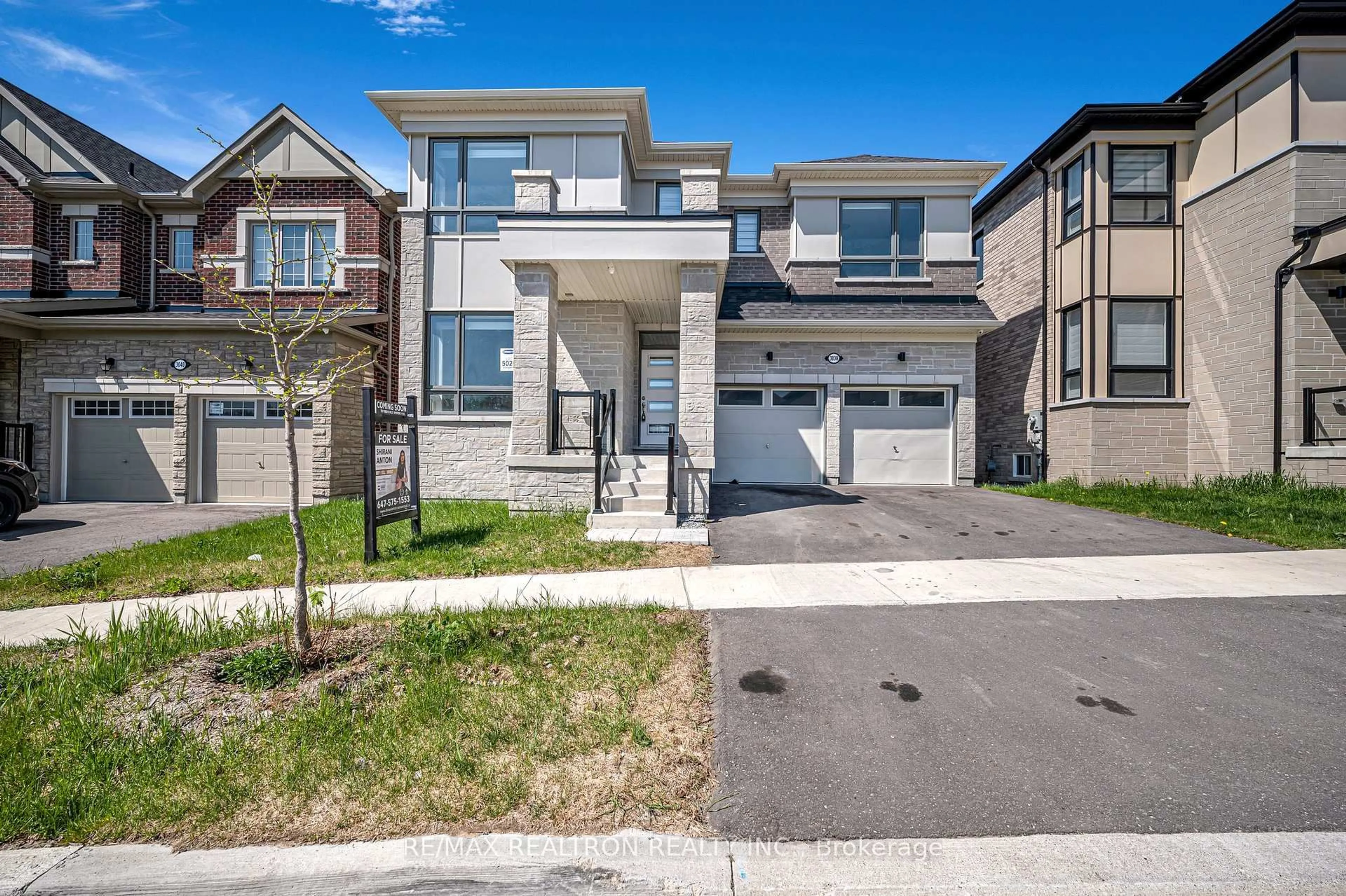 Home with brick exterior material, street for 3038 Hollyberry Tr, Pickering Ontario L1X 0N5