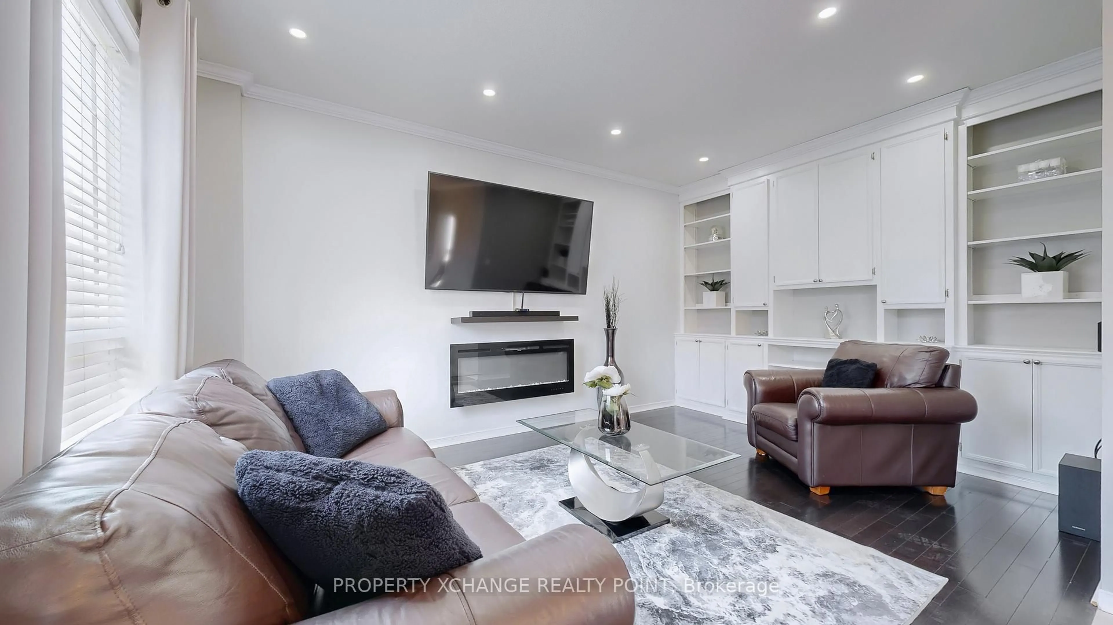 Living room with furniture, wood/laminate floor for 1090 Songbird Dr, Oshawa Ontario L1K 2Y9