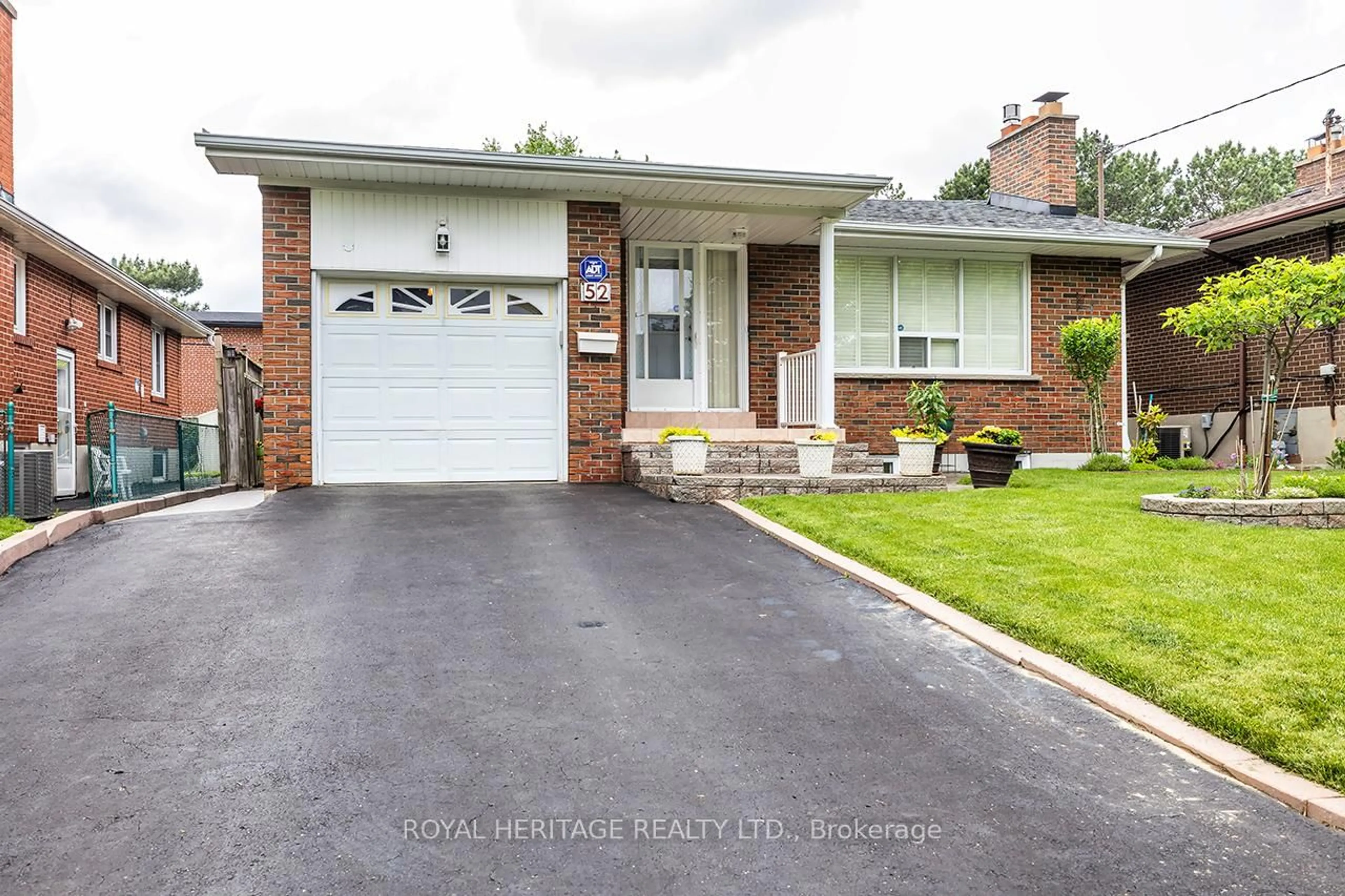 Home with brick exterior material, street for 52 Moraine Hill Dr, Toronto Ontario M1T 2A2