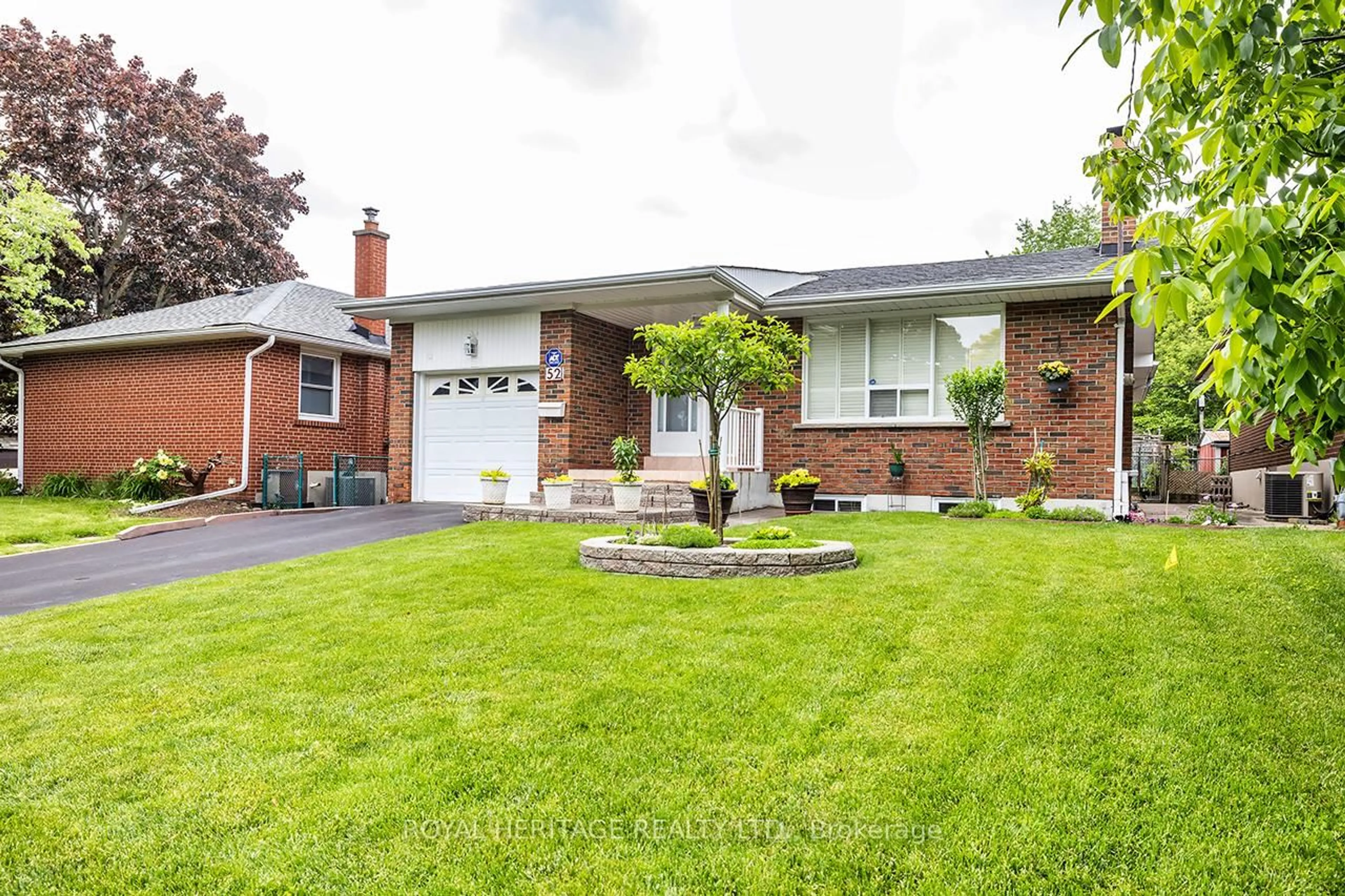 Home with brick exterior material, street for 52 Moraine Hill Dr, Toronto Ontario M1T 2A2
