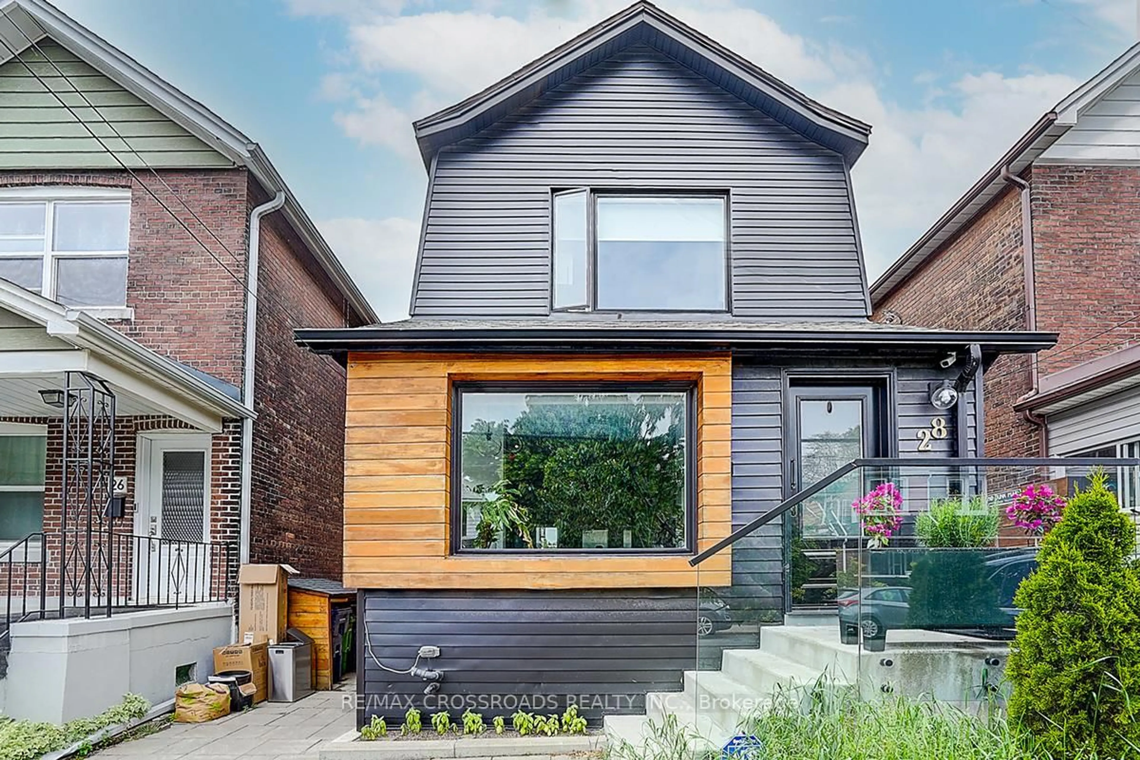 Home with brick exterior material, street for 28 Chisholm Ave, Toronto Ontario M4C 4V2