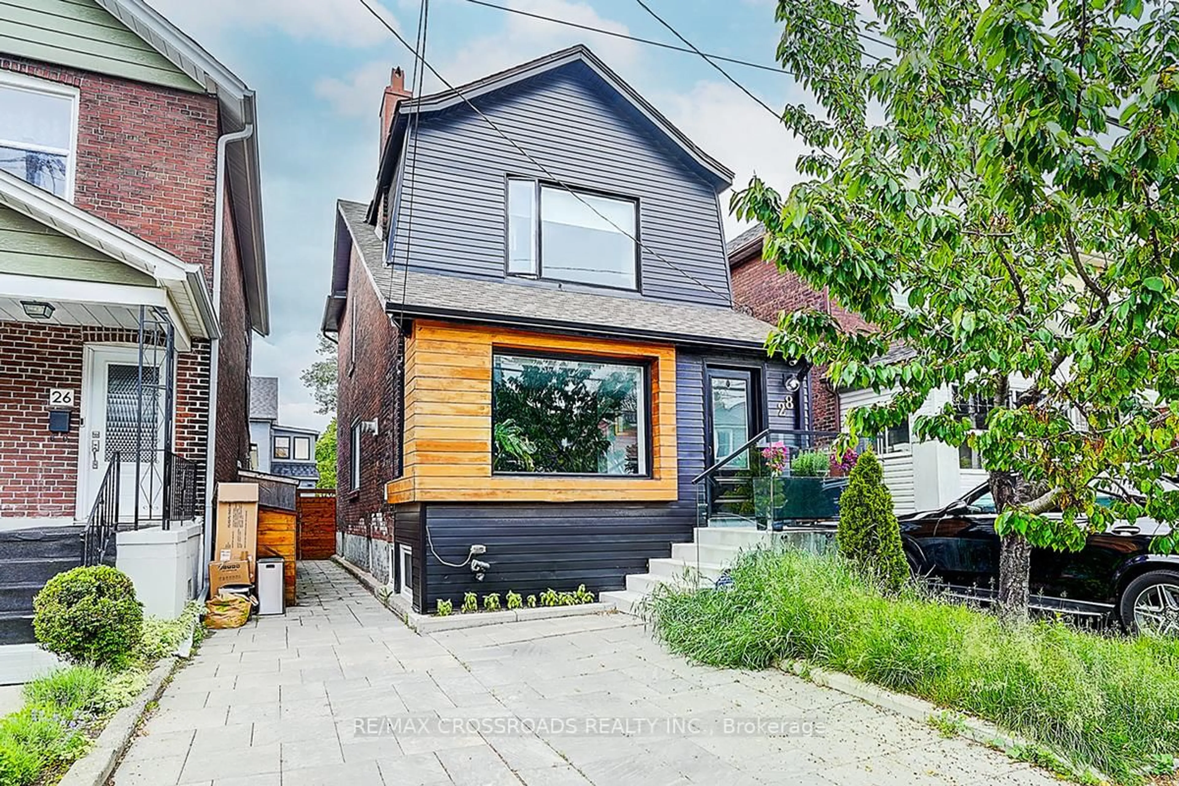 Home with brick exterior material, street for 28 Chisholm Ave, Toronto Ontario M4C 4V2