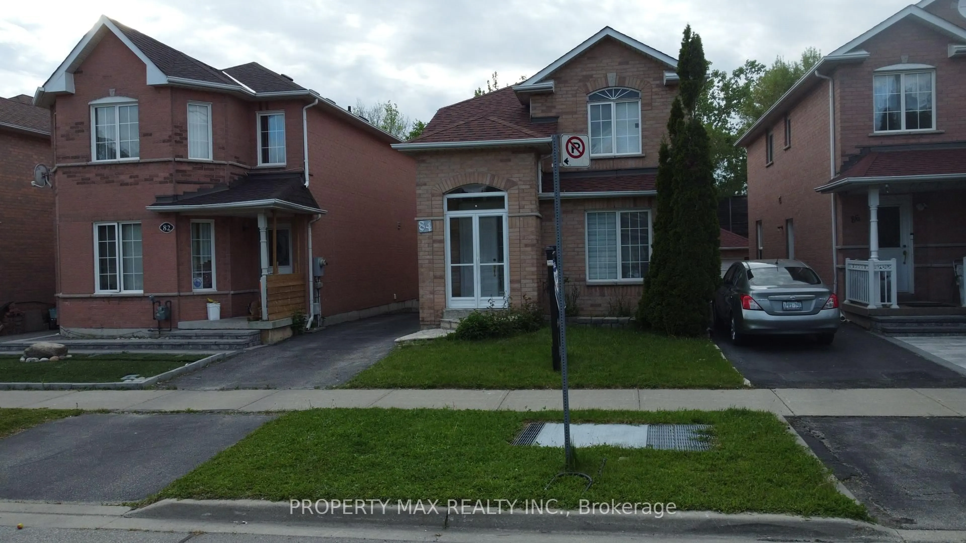 Home with brick exterior material, street for 84 Bridlegrove Dr, Toronto Ontario M1W 3W9