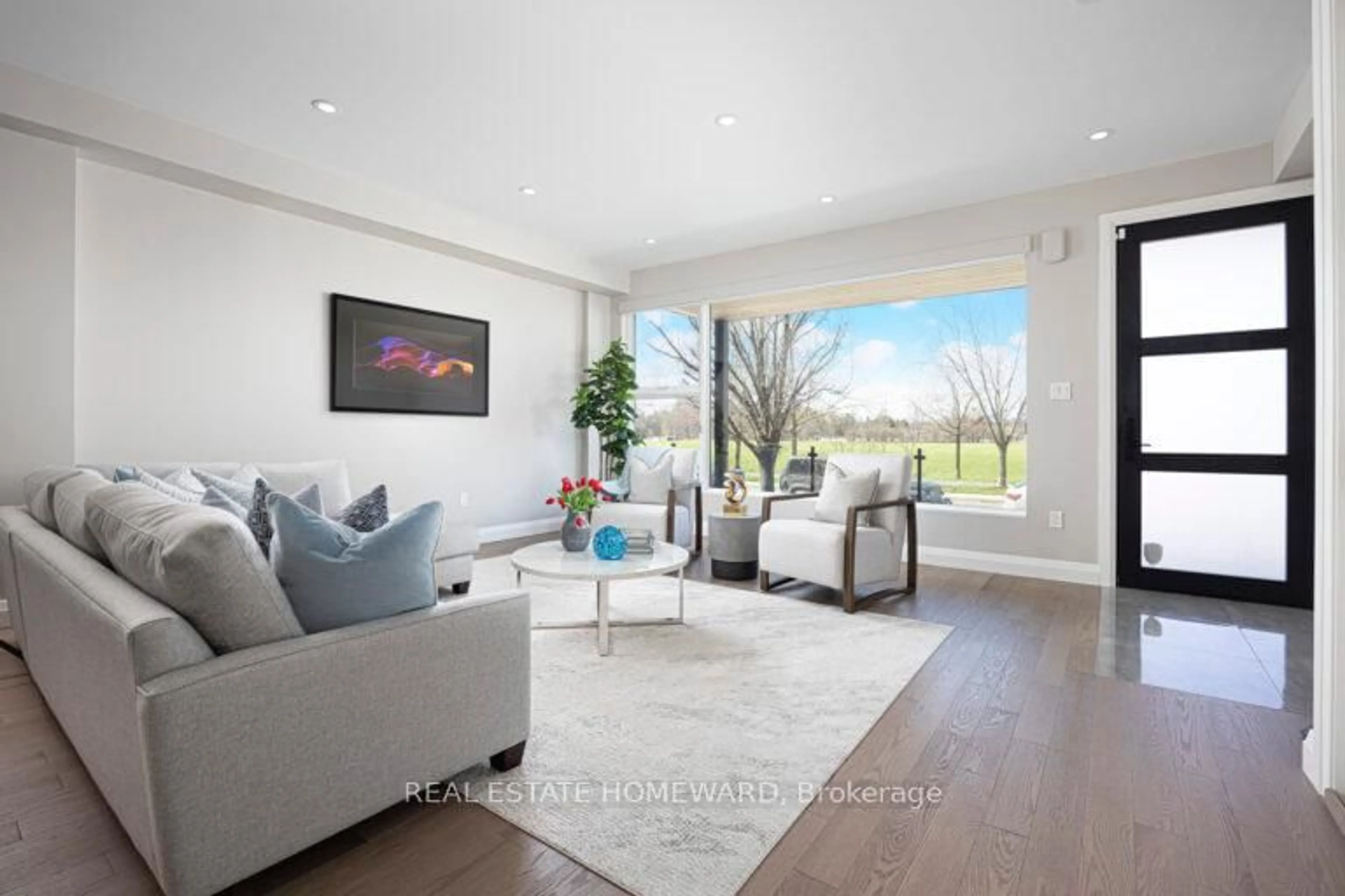 Living room with furniture, unknown for 83 Northern Dancer Blvd, Toronto Ontario M4L 3Z8