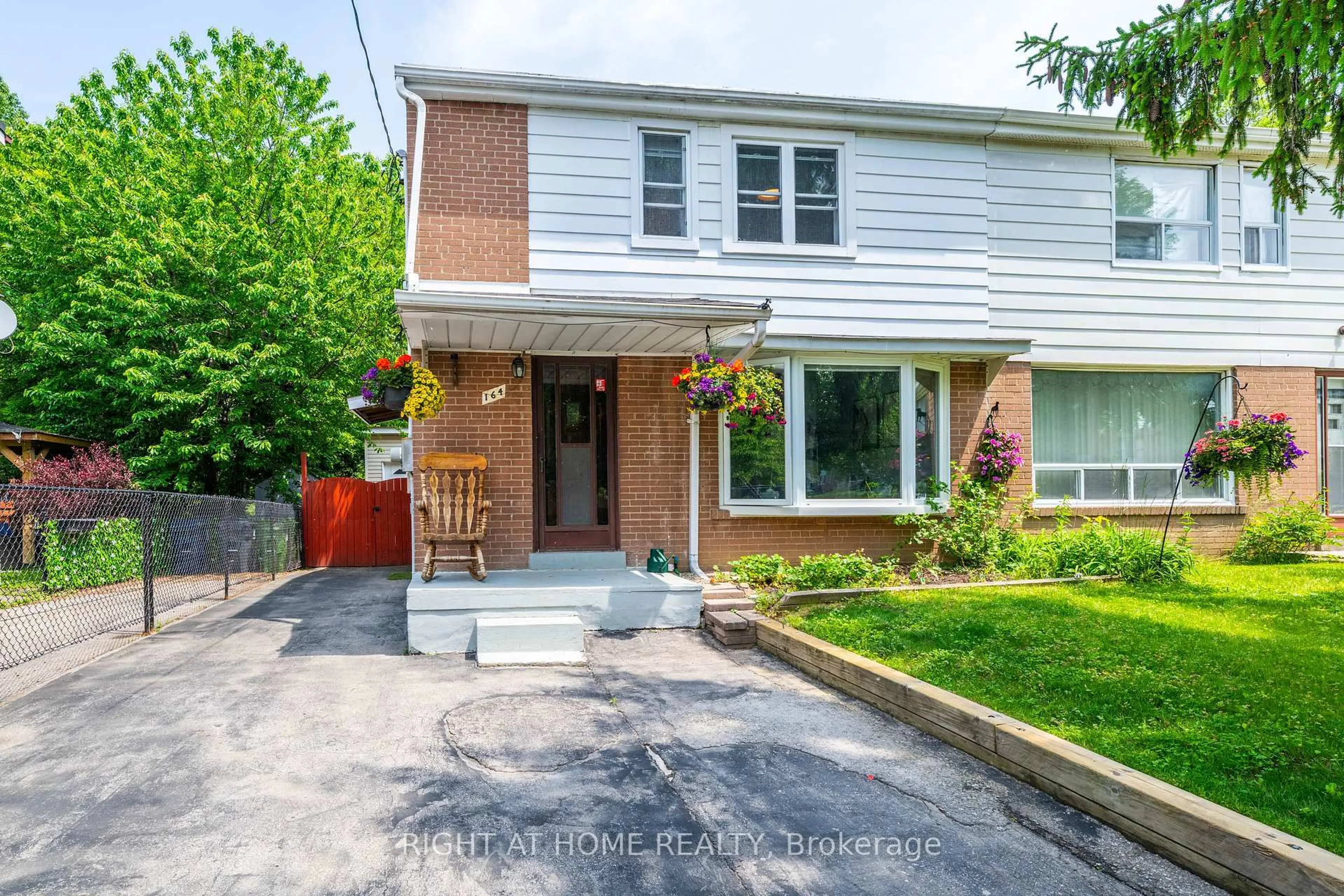 Home with brick exterior material, street for 164 Woodfern Dr, Toronto Ontario M1K 2L5