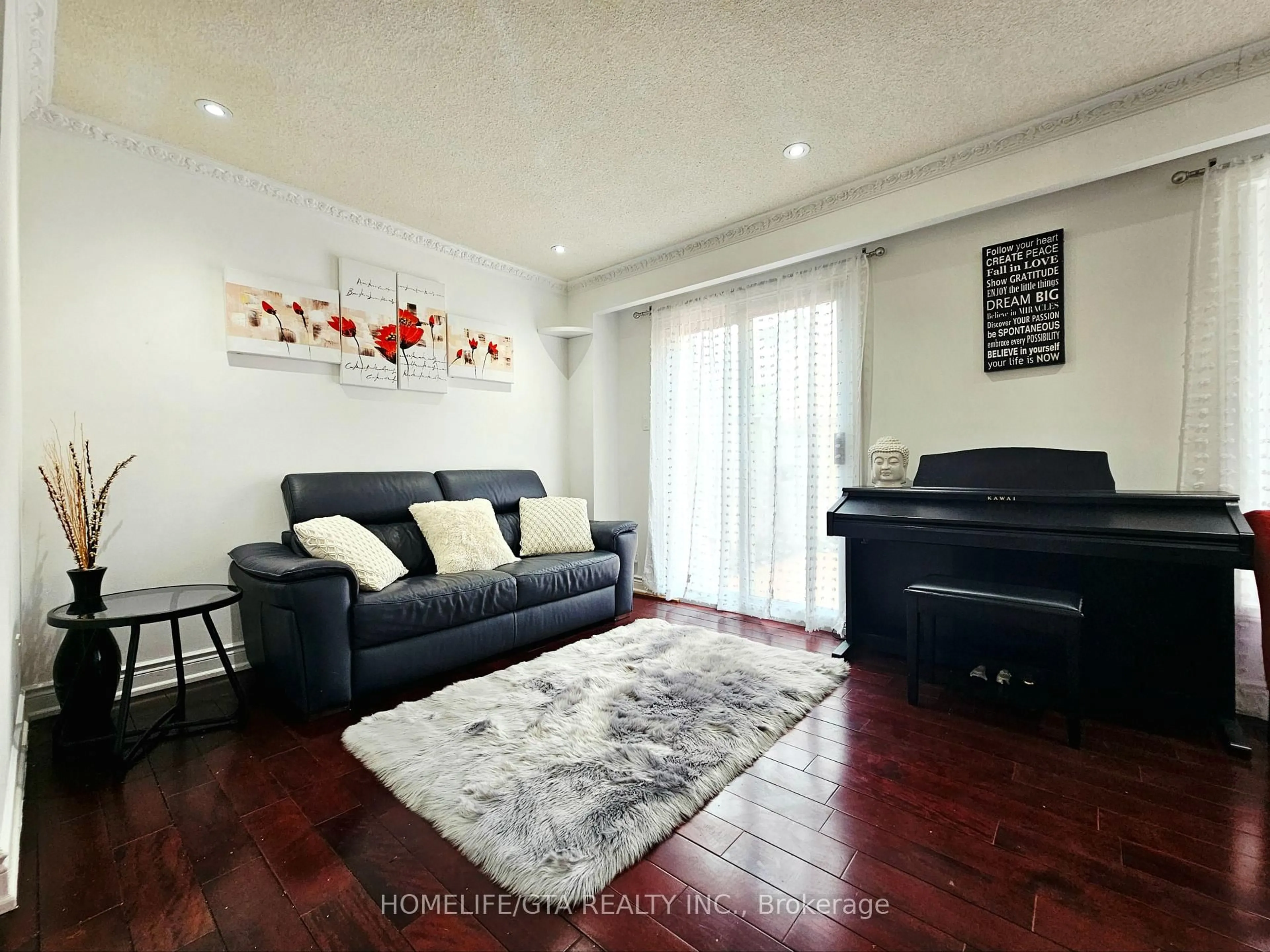 Living room with furniture, wood/laminate floor for 24 Bradstone Sq, Toronto Ontario M1B 1W2
