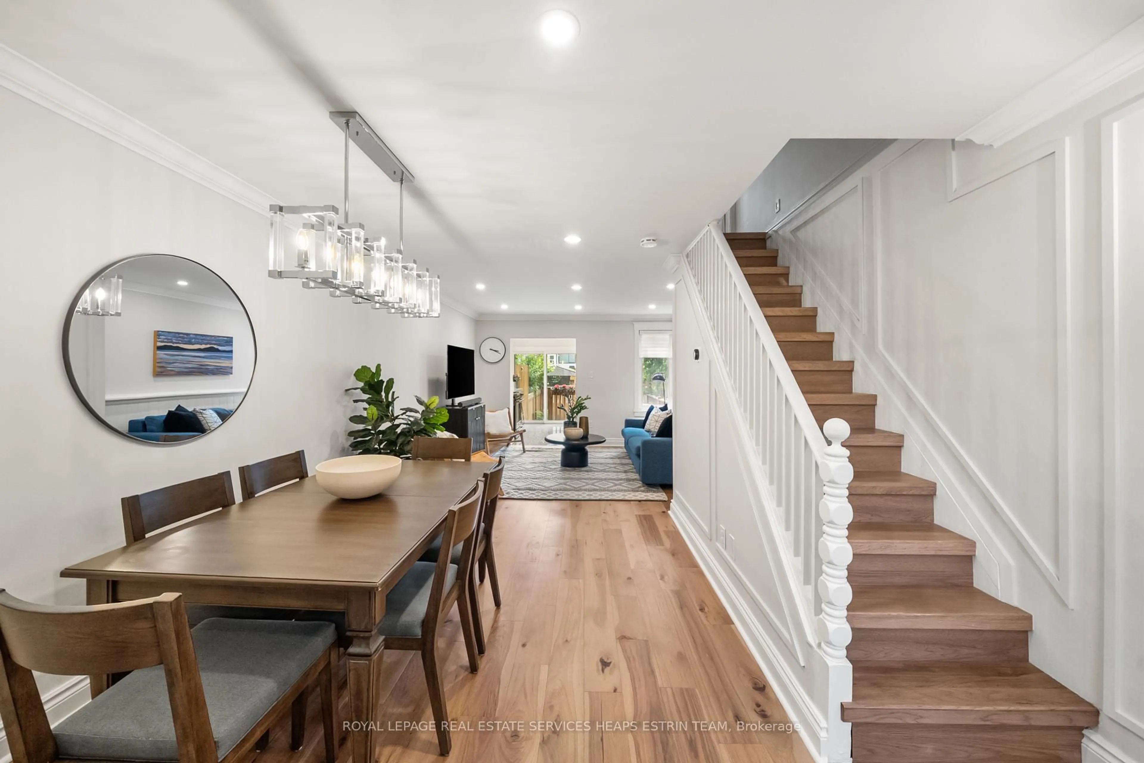 Open concept kitchen, wood/laminate floor for 18 Alton Ave, Toronto Ontario M4L 2M2